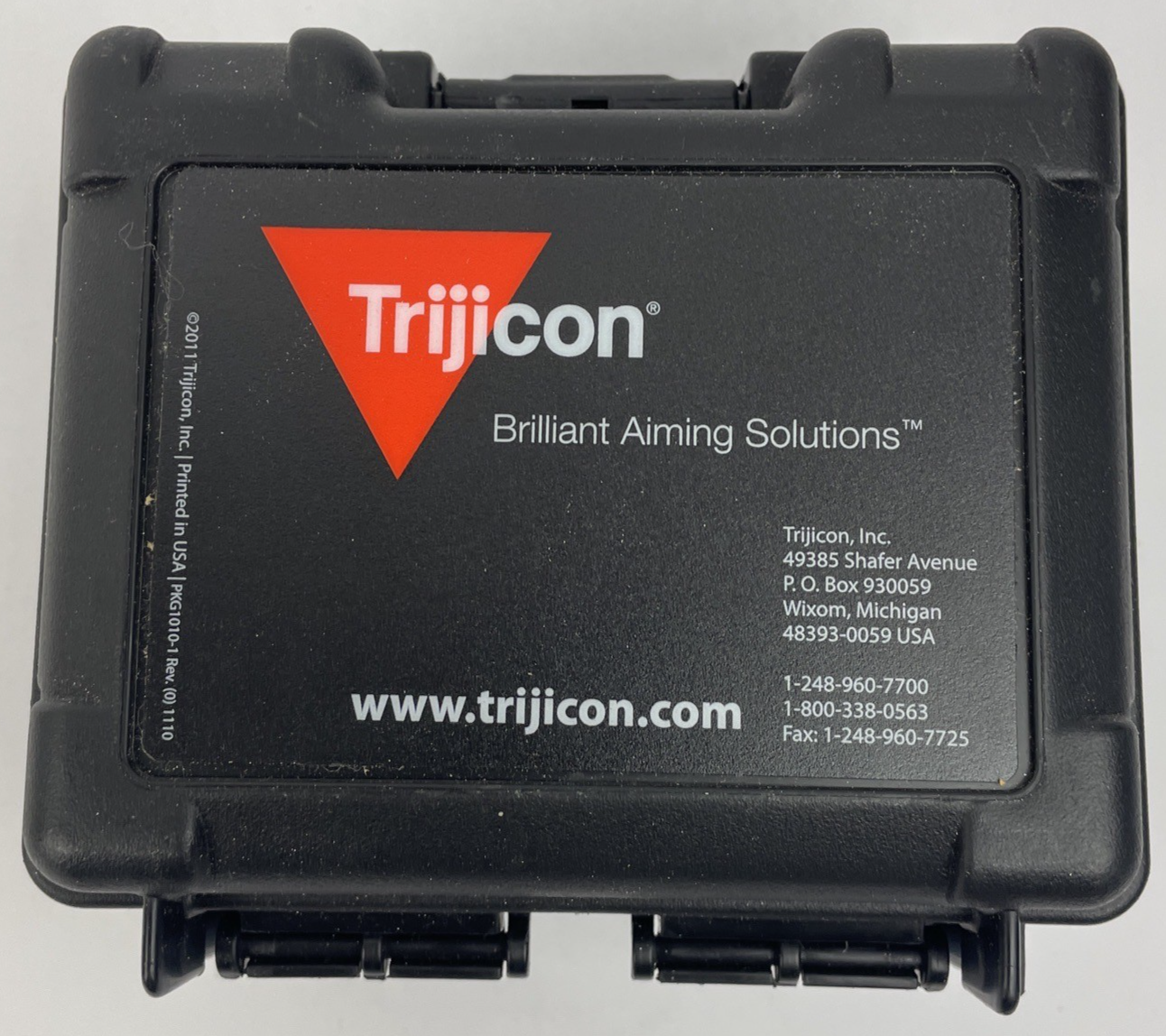 Trijicon OEM hard travel case with foam insert measuring 5.5 x 5 inches