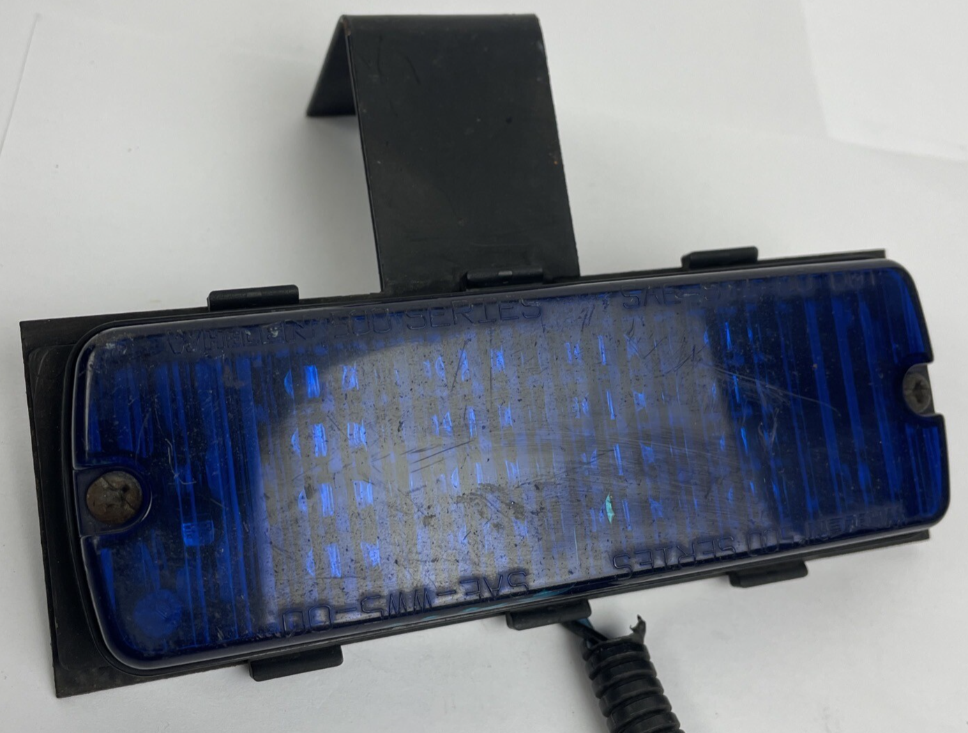 Whelen SmartLED 500 blue warning light bracket mounted