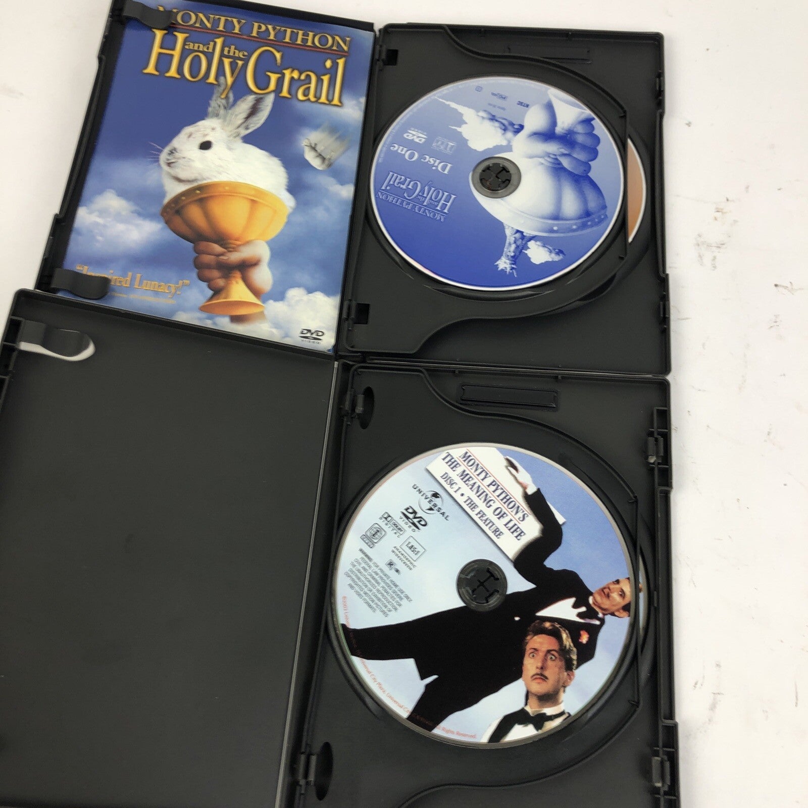 2 x Monty Python's DVD Video - The Meaning of Life - Holy Grail Very Good Cond.