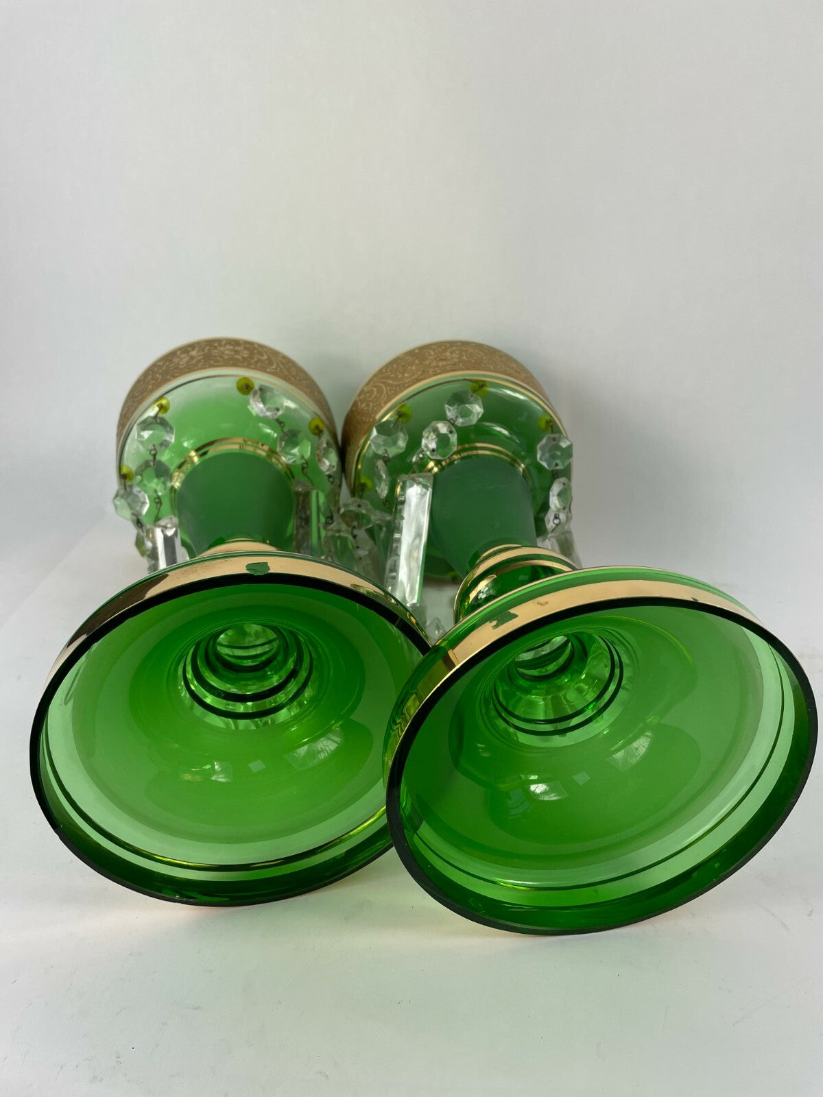Set of two beautifully designed decorative crafted clear glass display articles.