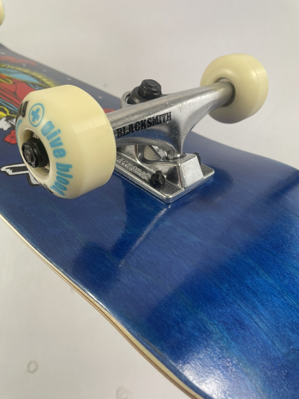 ATM Click Stay Strong 8-inch complete skateboard with Black Smith trucks and 52mm wheels.