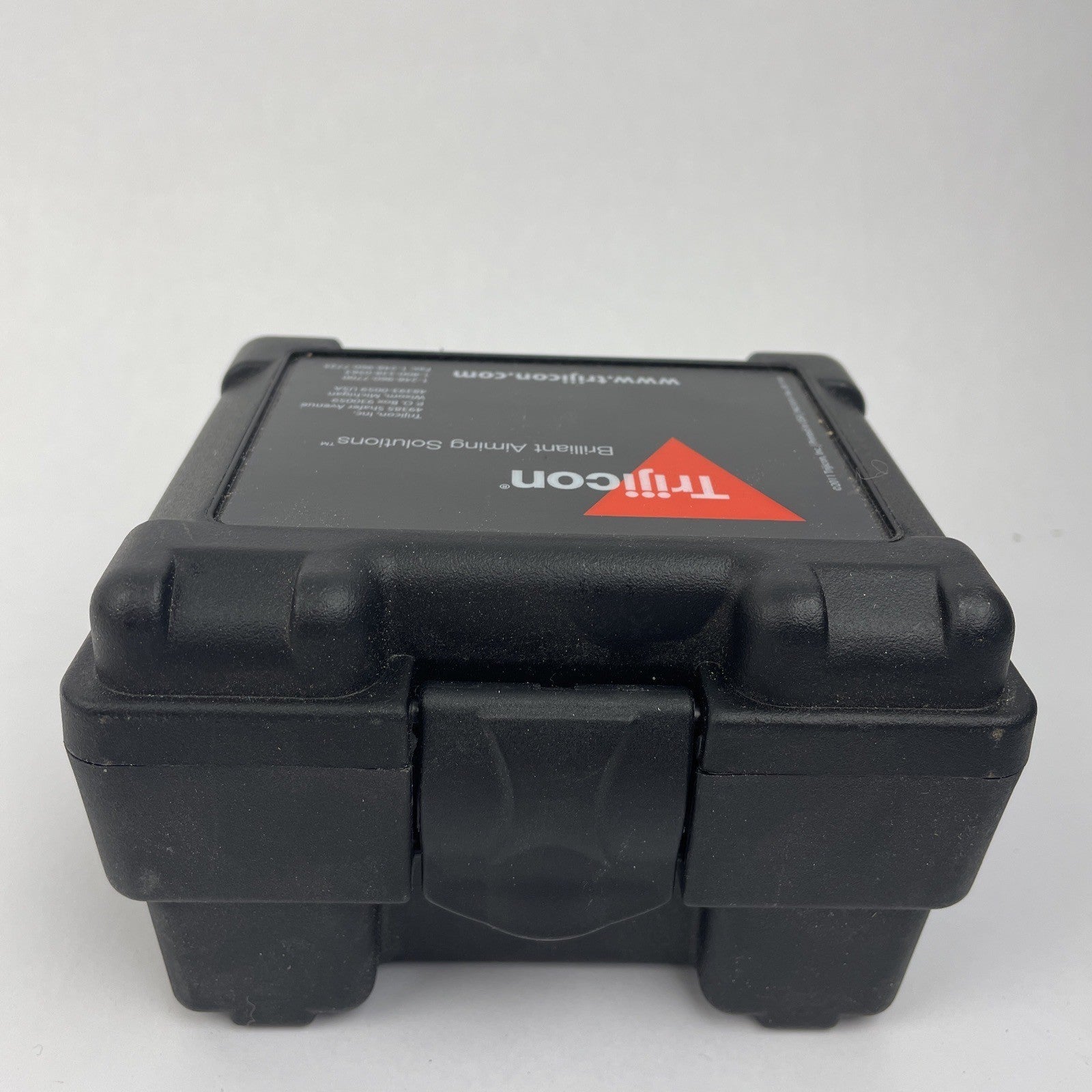Trijicon OEM hard travel case with foam insert measuring 5.5 x 5 inches
