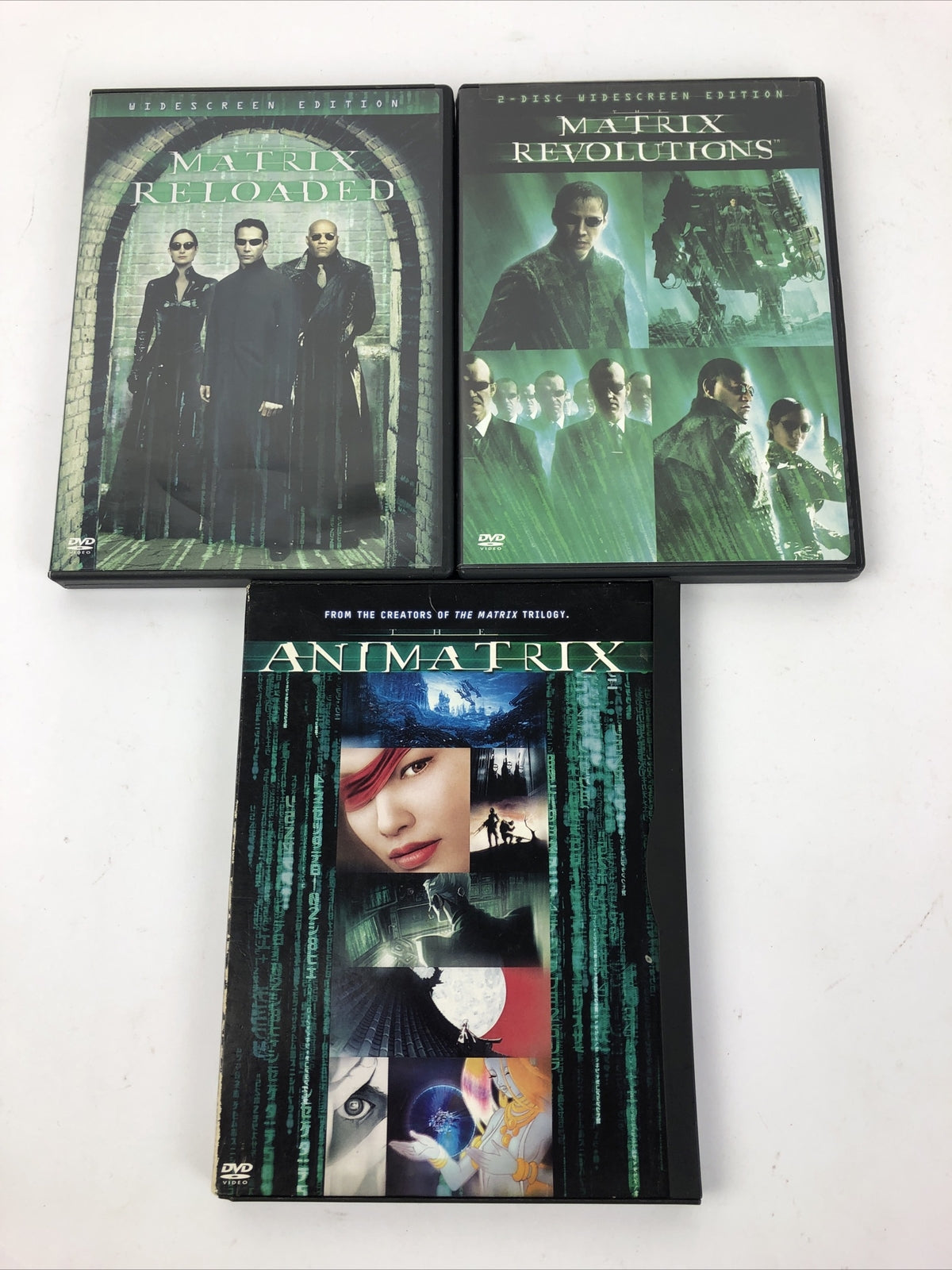 Lot of Three The Matrix Revolutions RELOADED + Animatrix ( DVD Video )