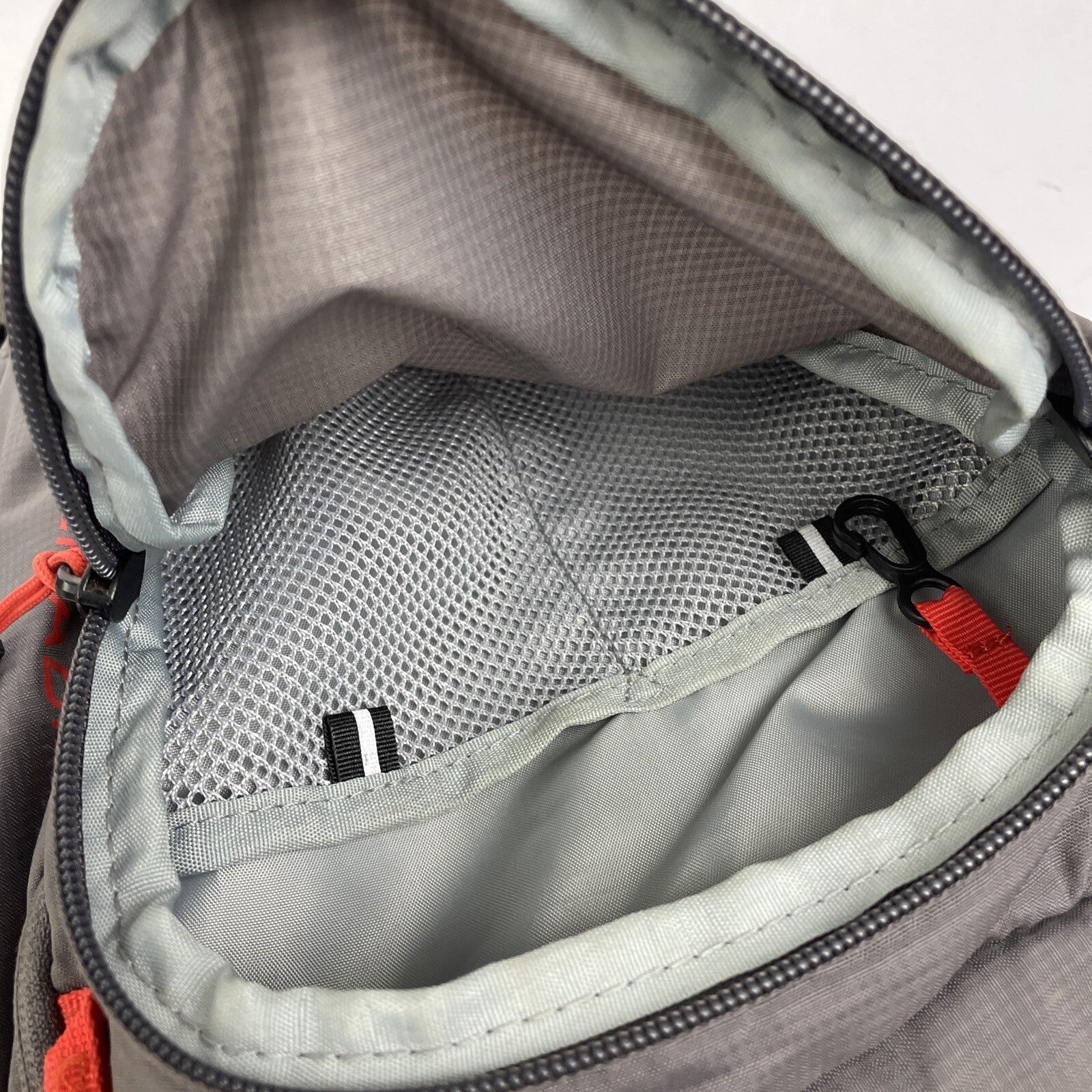 High Sierra Visalia gray hydration backpack with adjustable straps and mesh back panel.