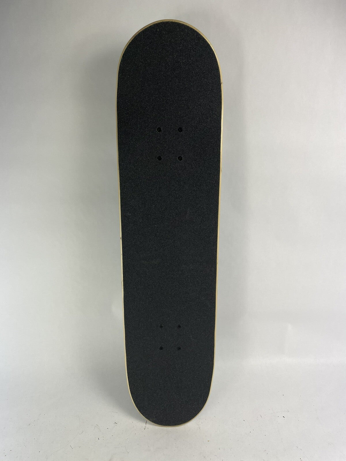 Blue blank 8-inch complete skateboard with gravity cast trucks, 52mm ATM wheels, and ABEC 7 bearings.
