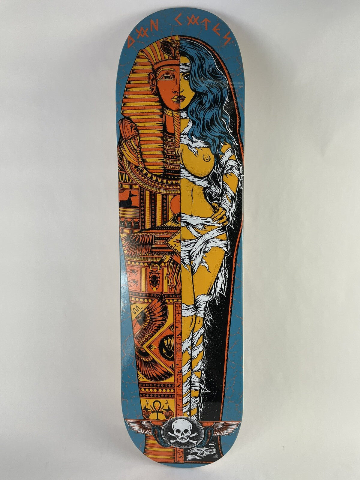 Death Skateboards Dan Cates Blue Mummy Pro 8.375-inch skateboard deck with grip tape and signature graphic.