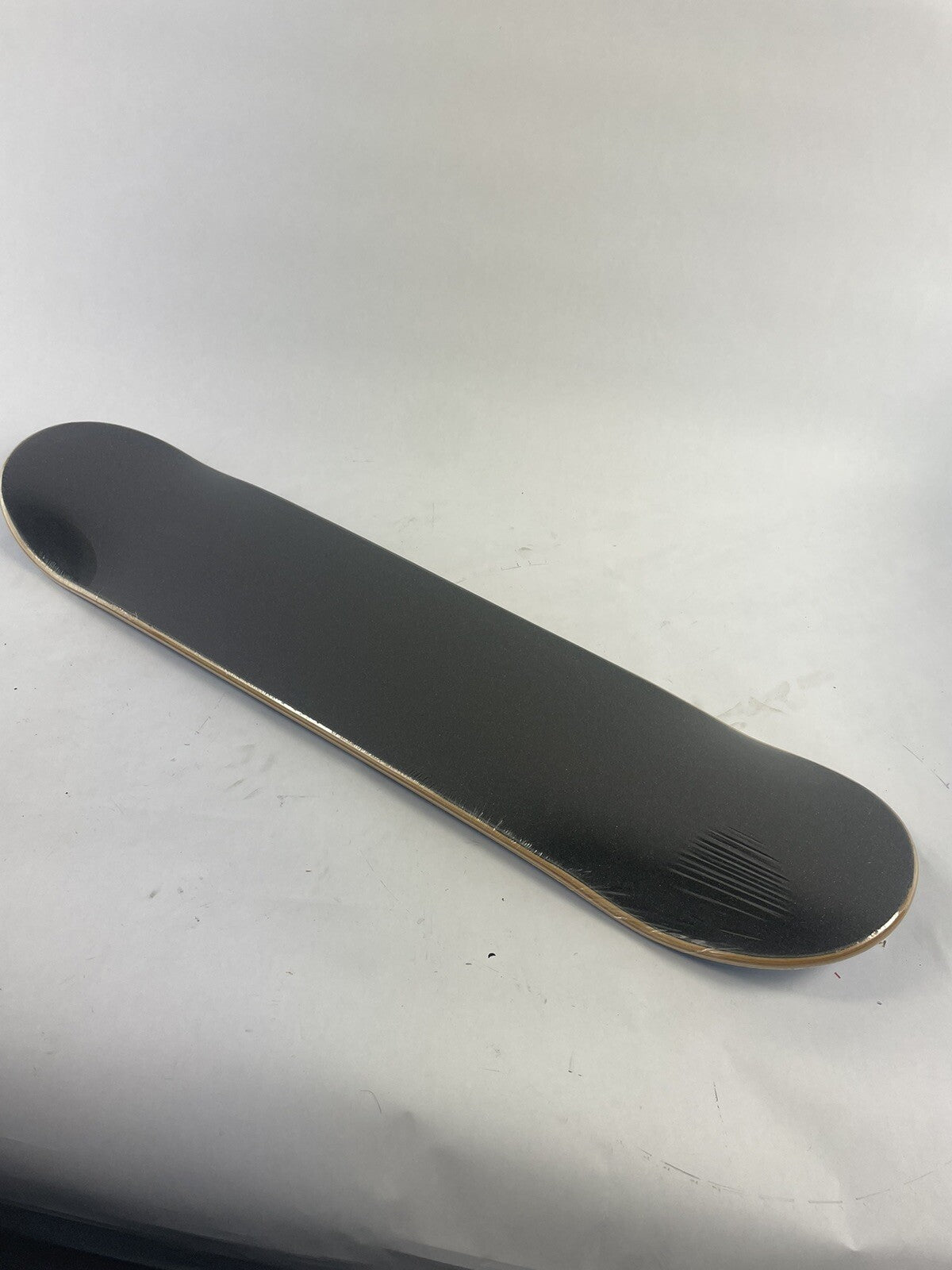 Rare UCLA Bruins 7.5 x 31-inch pre-gripped skateboard deck.
