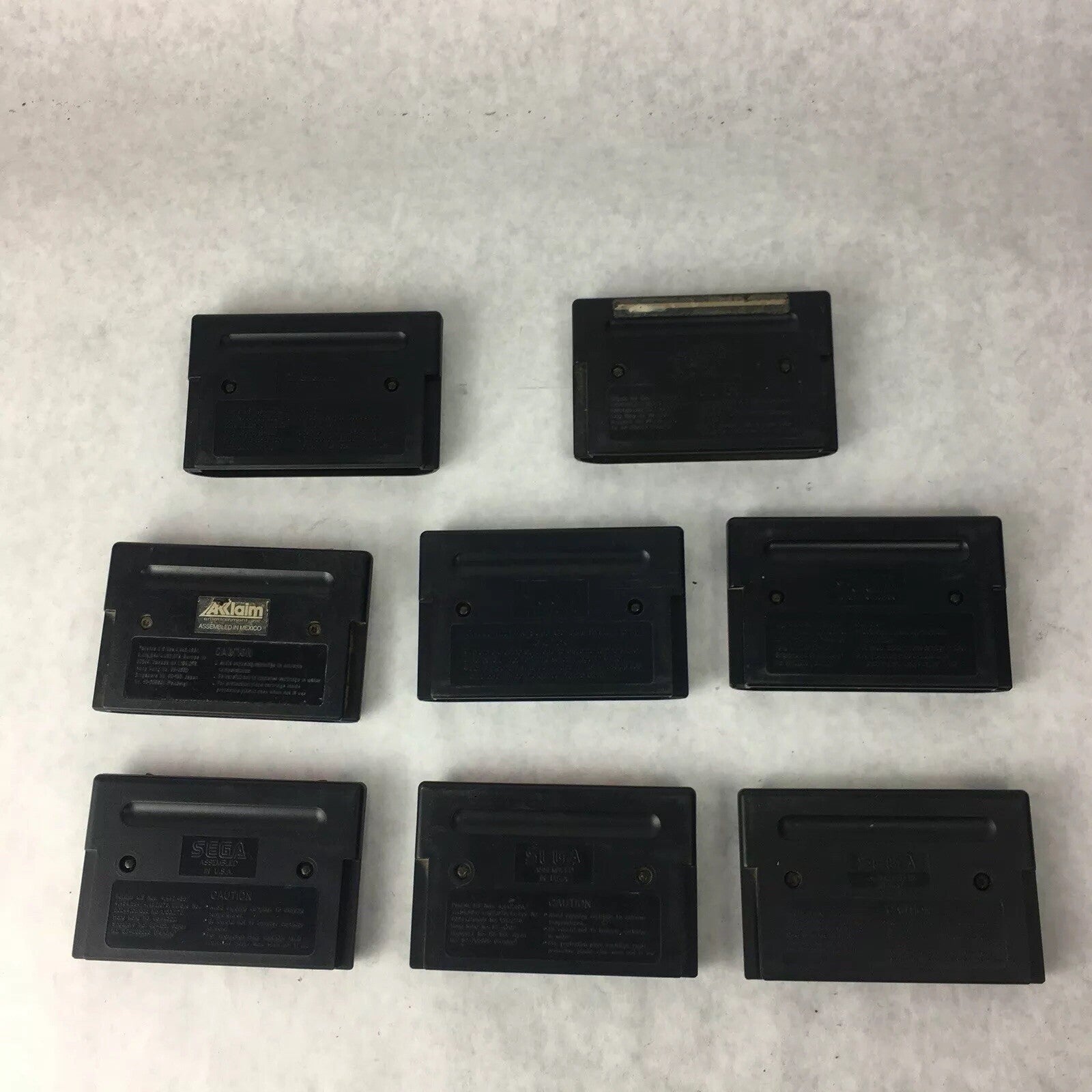 Lot of 8 authentic Sega Genesis games including Mortal Kombat Zoop MIG-29 Monopoly and Outdoor Bass