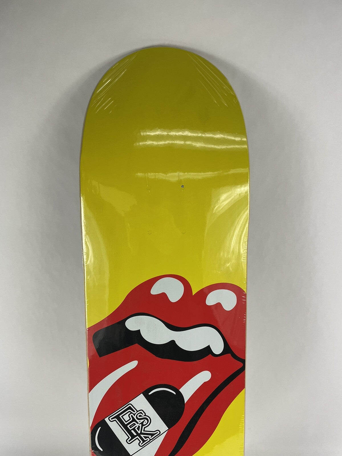 Hull Skateboards Tongue and Lips Logo 8.125-inch hard rock maple skateboard deck with premium graphic design.