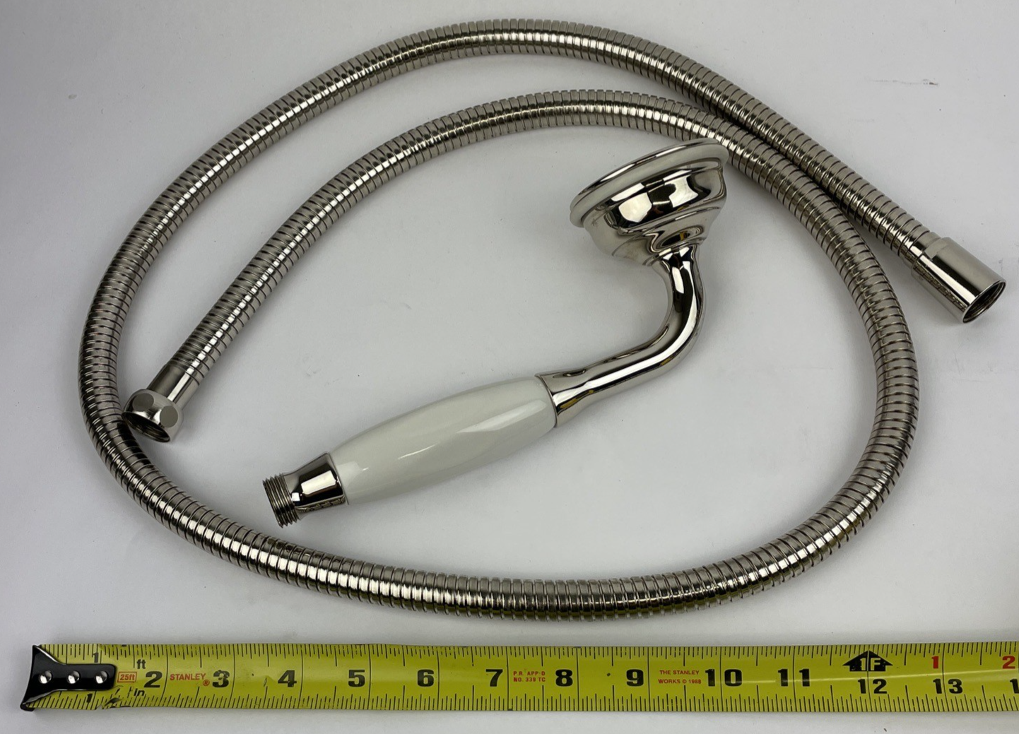 Designer Cooper chrome hand shower with porcelain handle and stainless steel hose