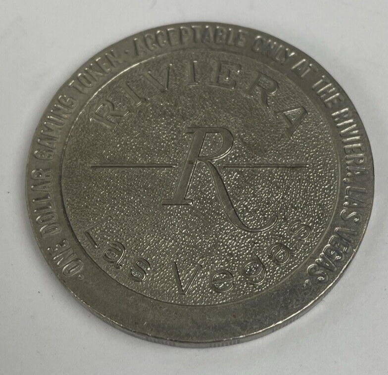 RIVIERA HOTEL CASINO 1984 $1 ONE DOLLAR GAMING COIN TOKEN GOLF - Las Vegas, NV