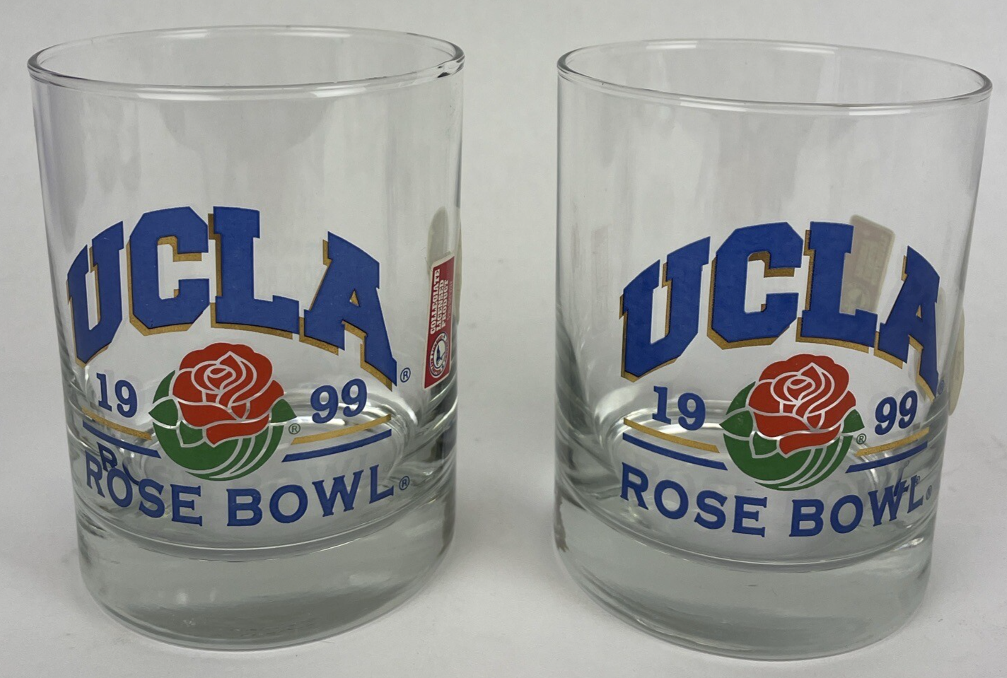 2 x Vintage UCLA Rose Bowl 1999 Bar Glass Blue With Gold Trim Print Clear Glass