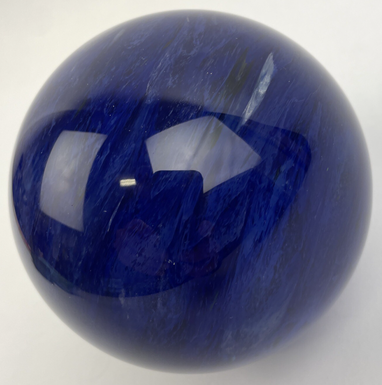 Hand blown cobalt blue crystal art glass paperweight measuring 4 inches and weighing 3.7 lbs.