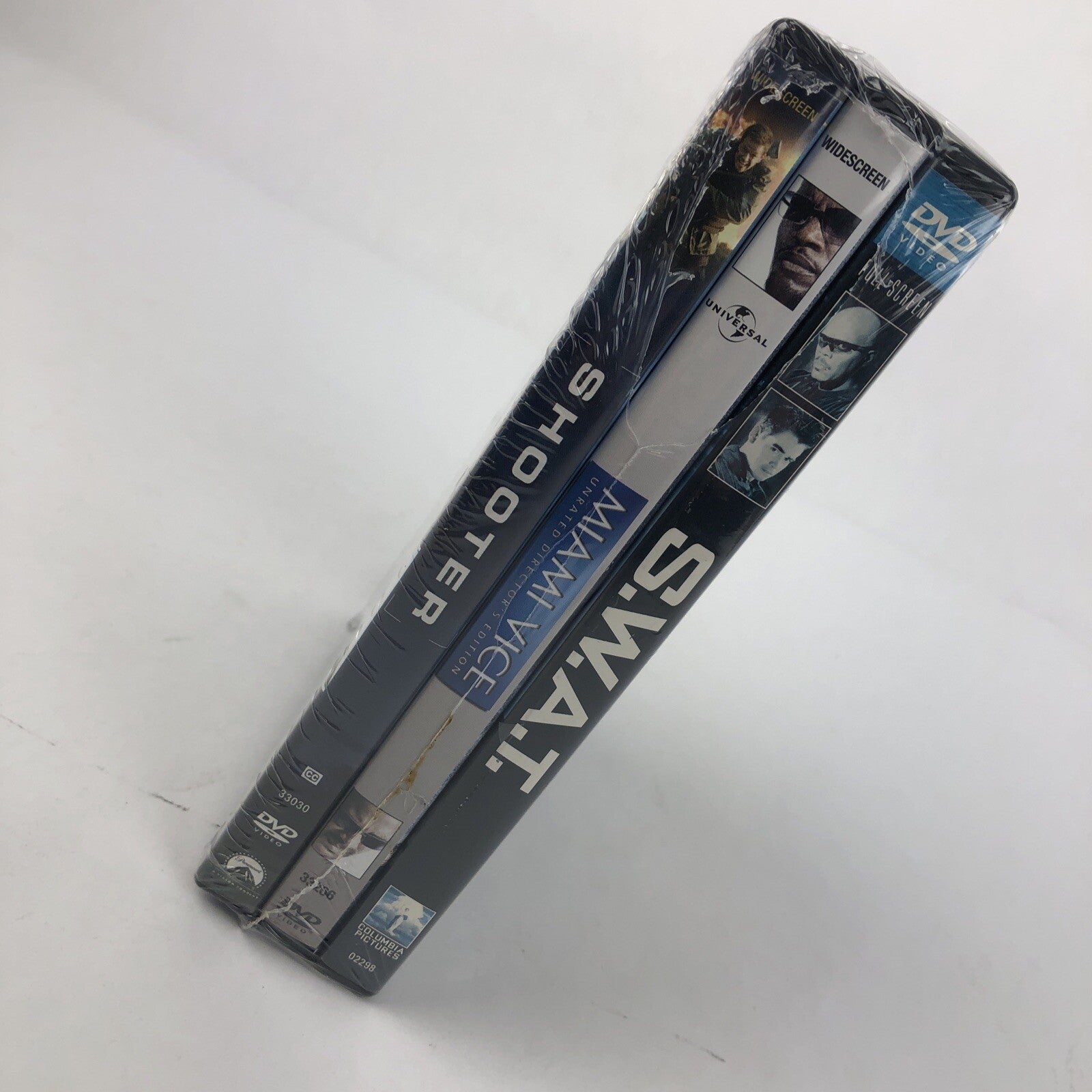 Action Lot 3 of DVD’s Miami Vice , S.W.A.T Collin Farrell, Shooter Mark Wahlburg