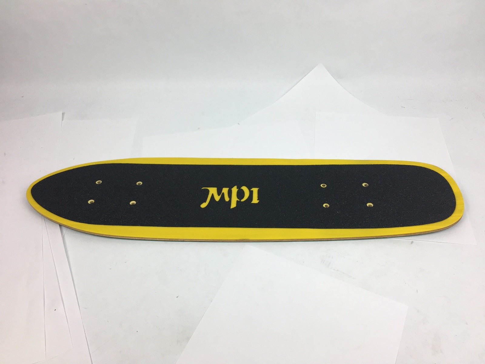 MPI NOS fiberglass 25-inch old school funtail skateboard deck for slalom, cruising, and vintage skateboard collections.
