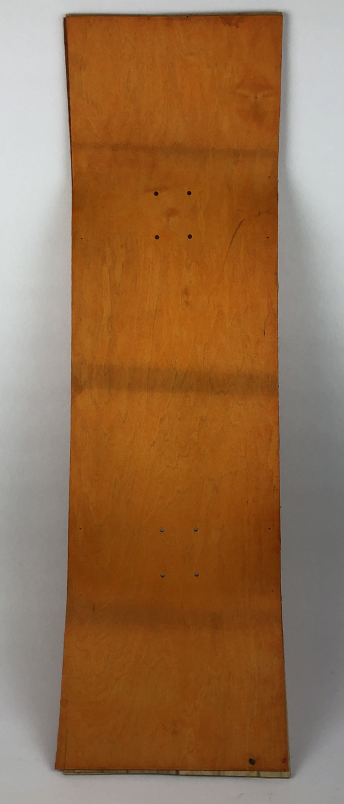 Blank uncut 10 x 34-inch orange stain skateboard deck with 14.25-inch wheelbase.