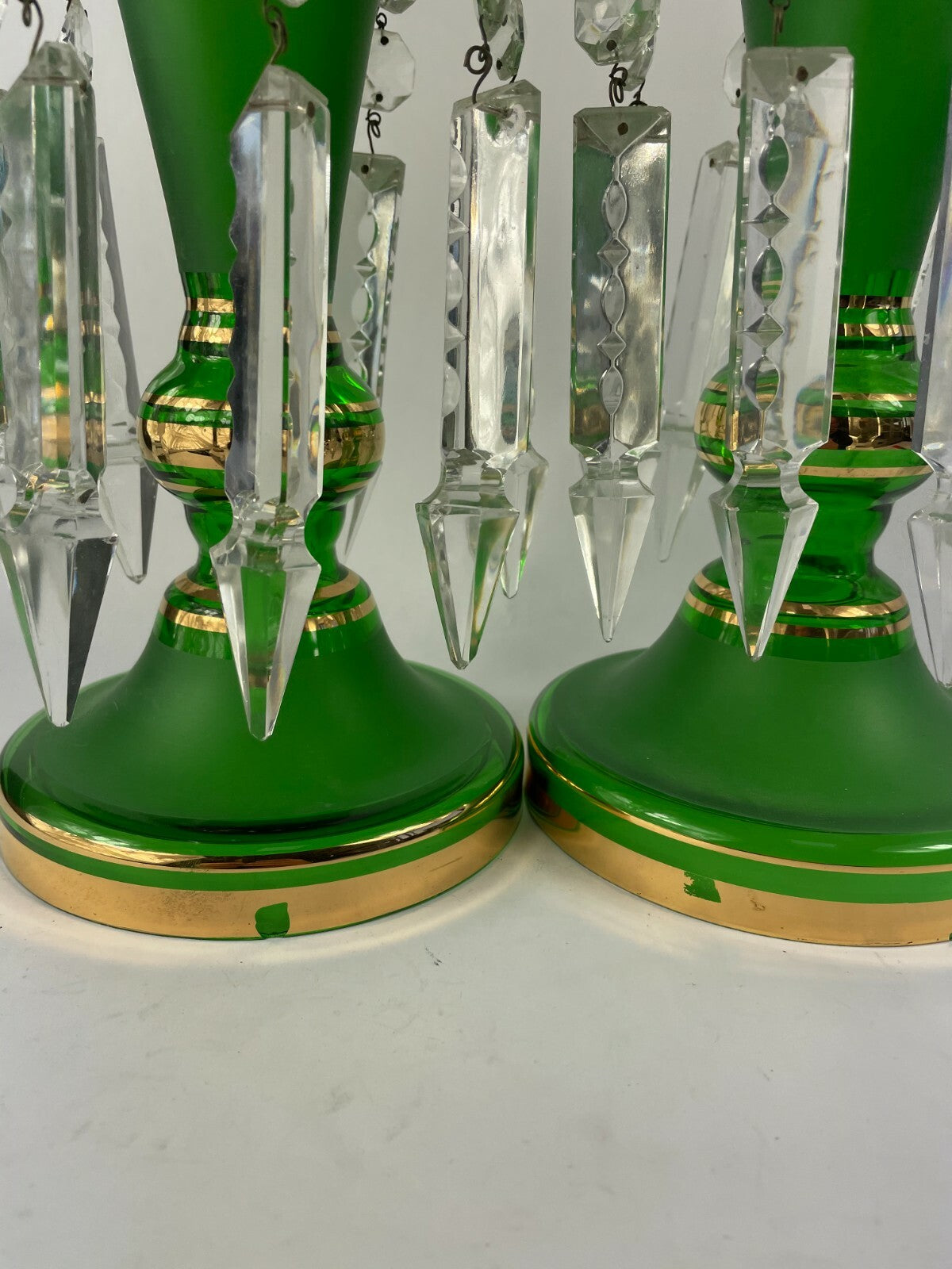 Set of two beautifully designed decorative crafted clear glass display articles.