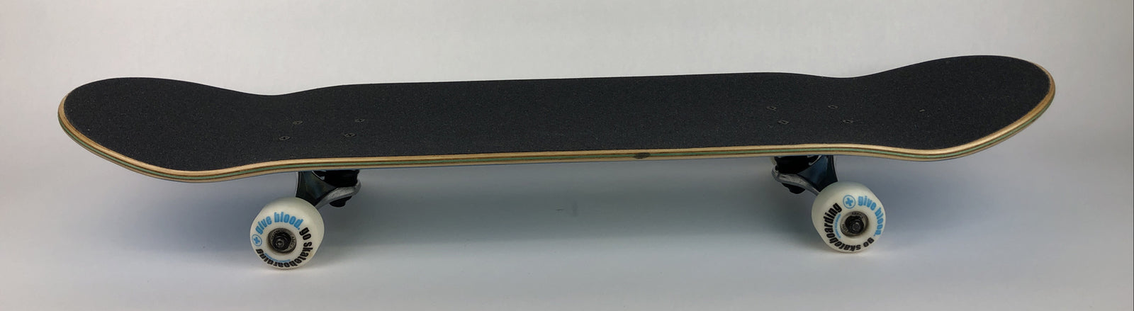 ATM Click Have a Nice Day 8-inch complete skateboard with Black Smith trucks and 52mm wheels.