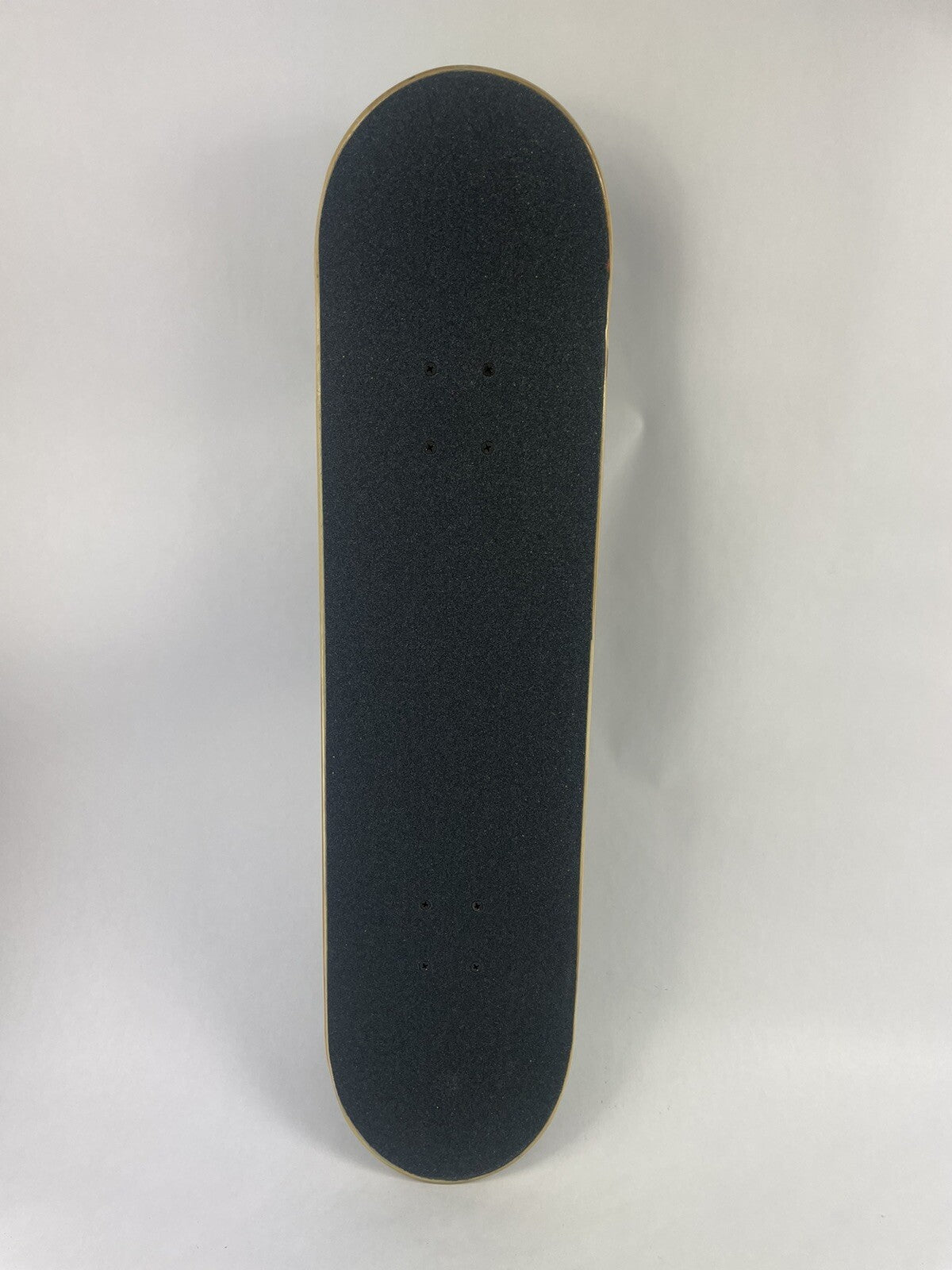 ATM Click Stay Strong 8-inch complete skateboard with Black Smith trucks and 52mm wheels.