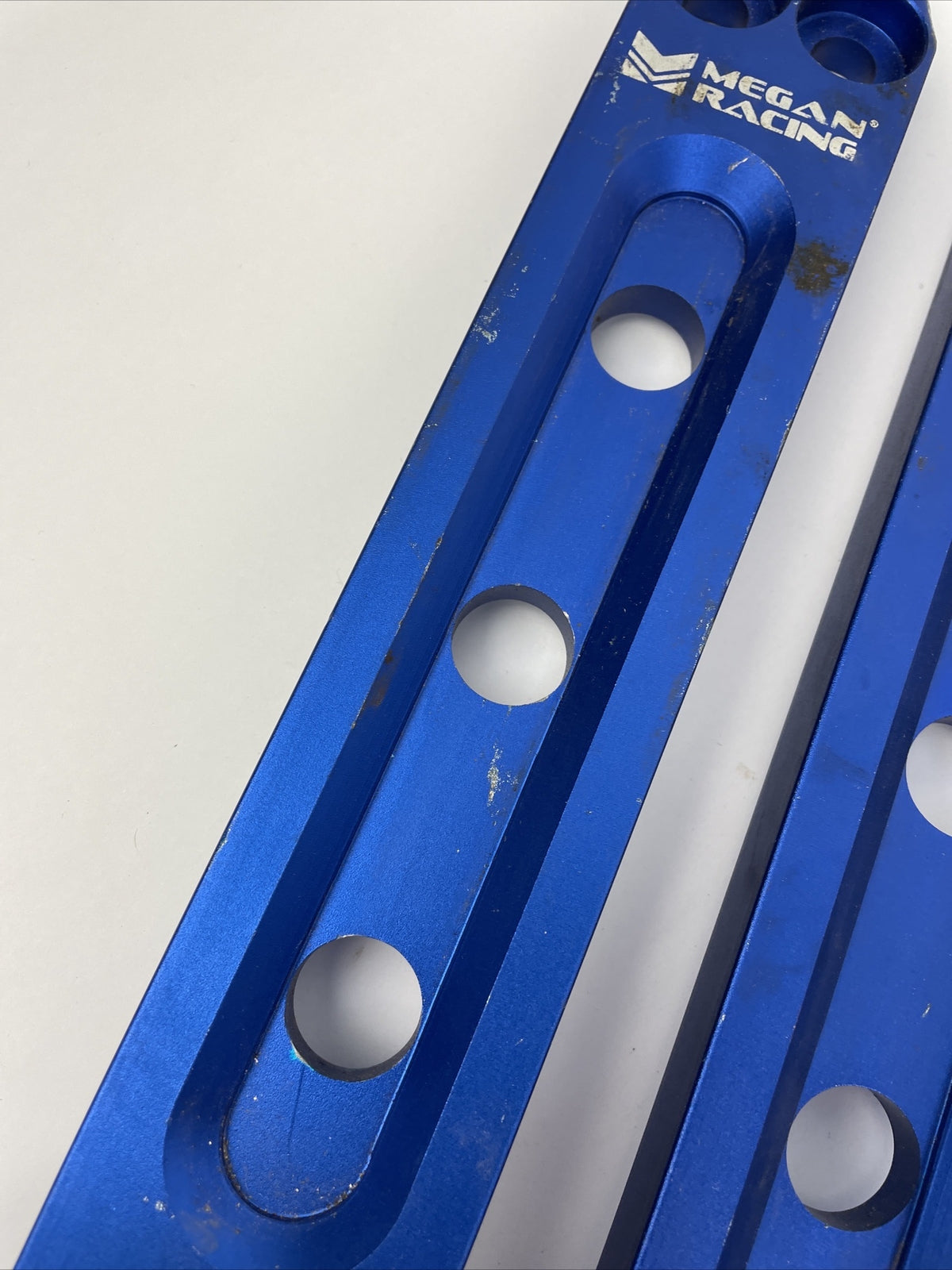 Megan Racing rear control arm bar blue