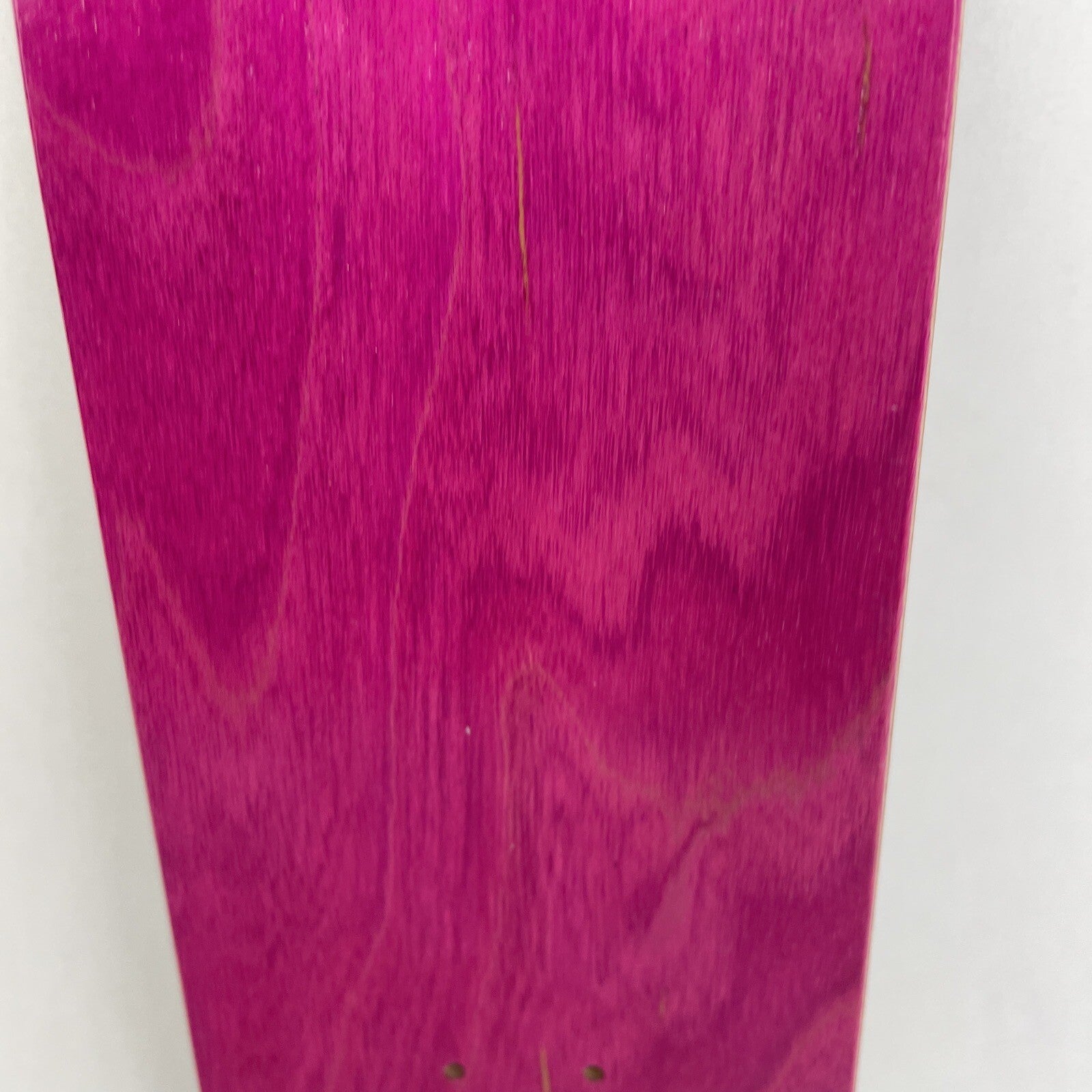 Blank Canadian maple miniature finger skateboard deck measuring 10.5 cm by 2.75 cm with 4.25 cm wheelbase.