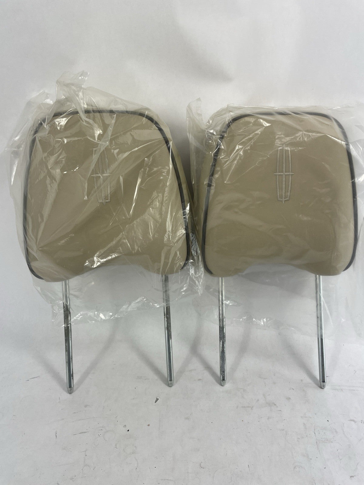 OEM Lincoln Navigator front headrest tan beige leather 2007-2014