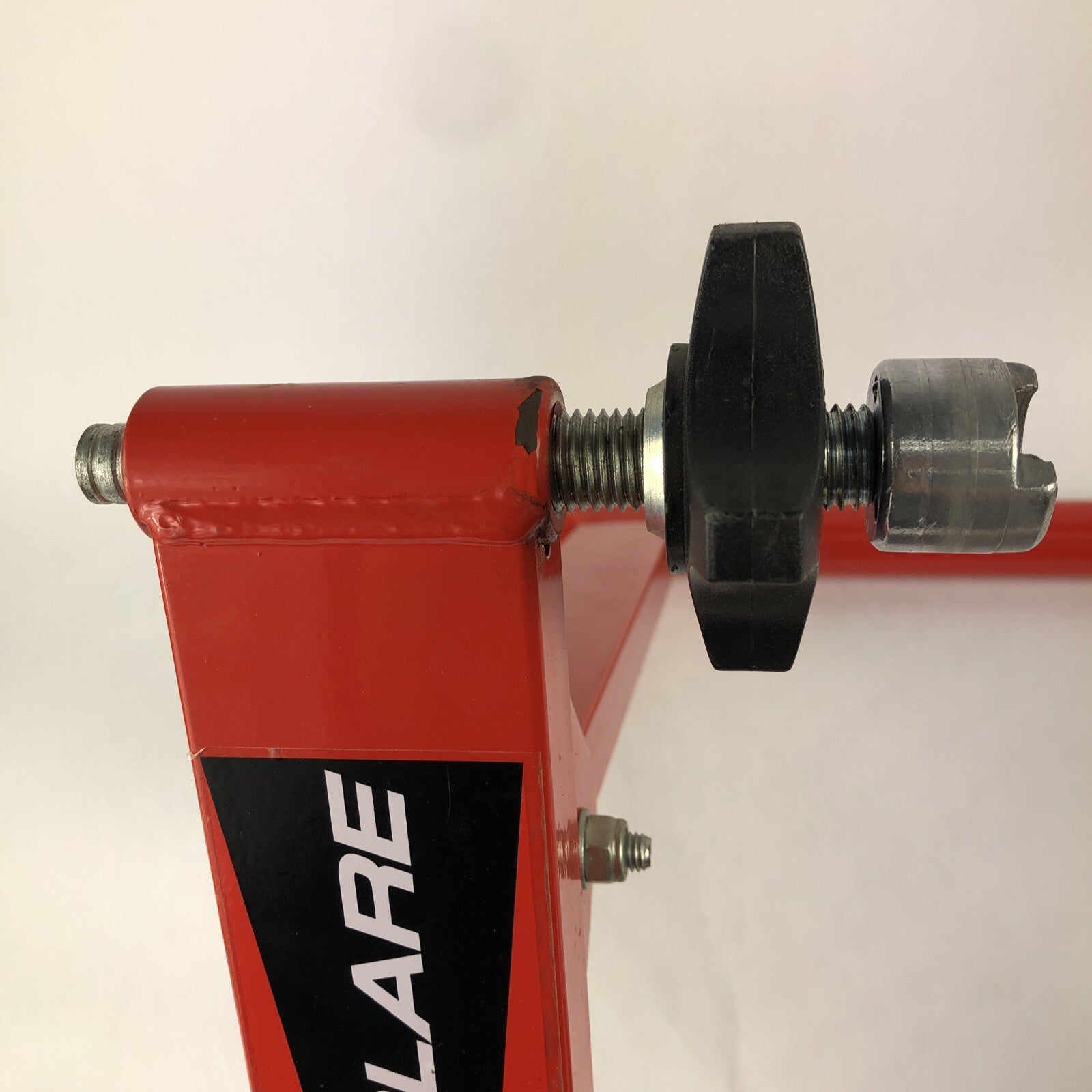 VOLARE Elite red indoor bicycle trainer made in Italy for road and hybrid bikes