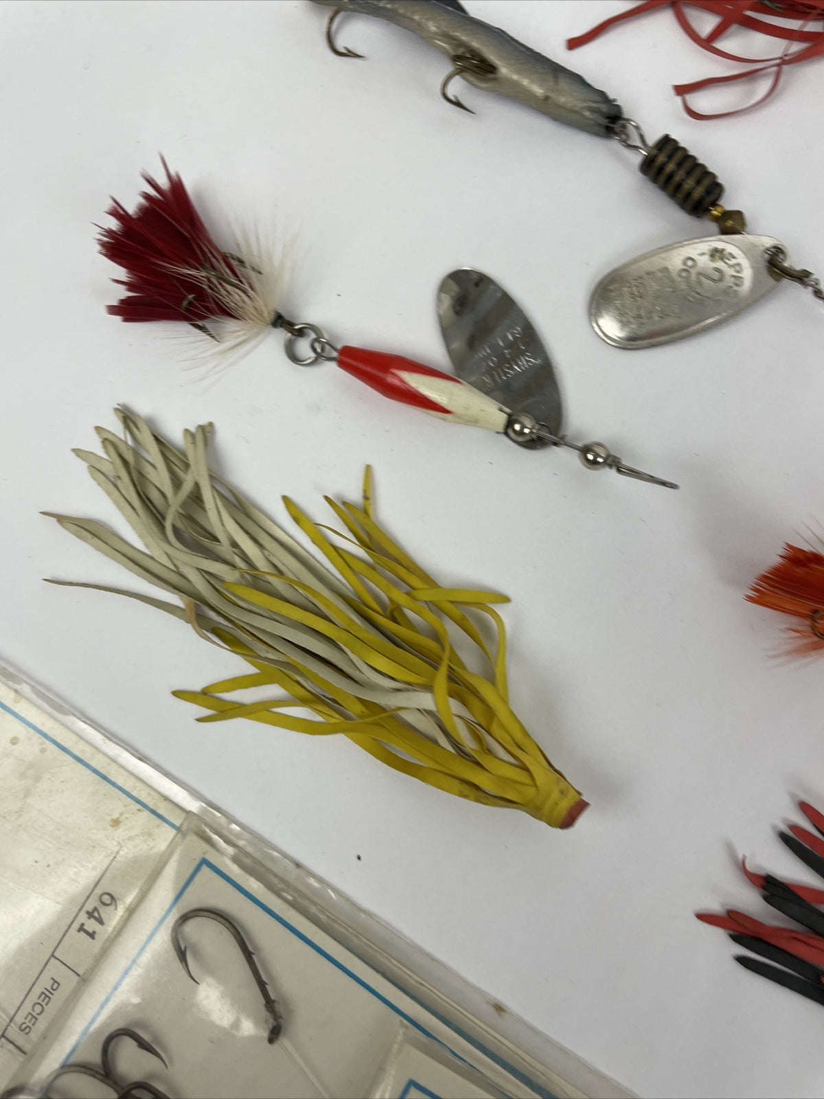 Vintage fishing lure lot with Jitterbug Rebel Floater Mepps and Shyster lures for trout crappie and bass fishing