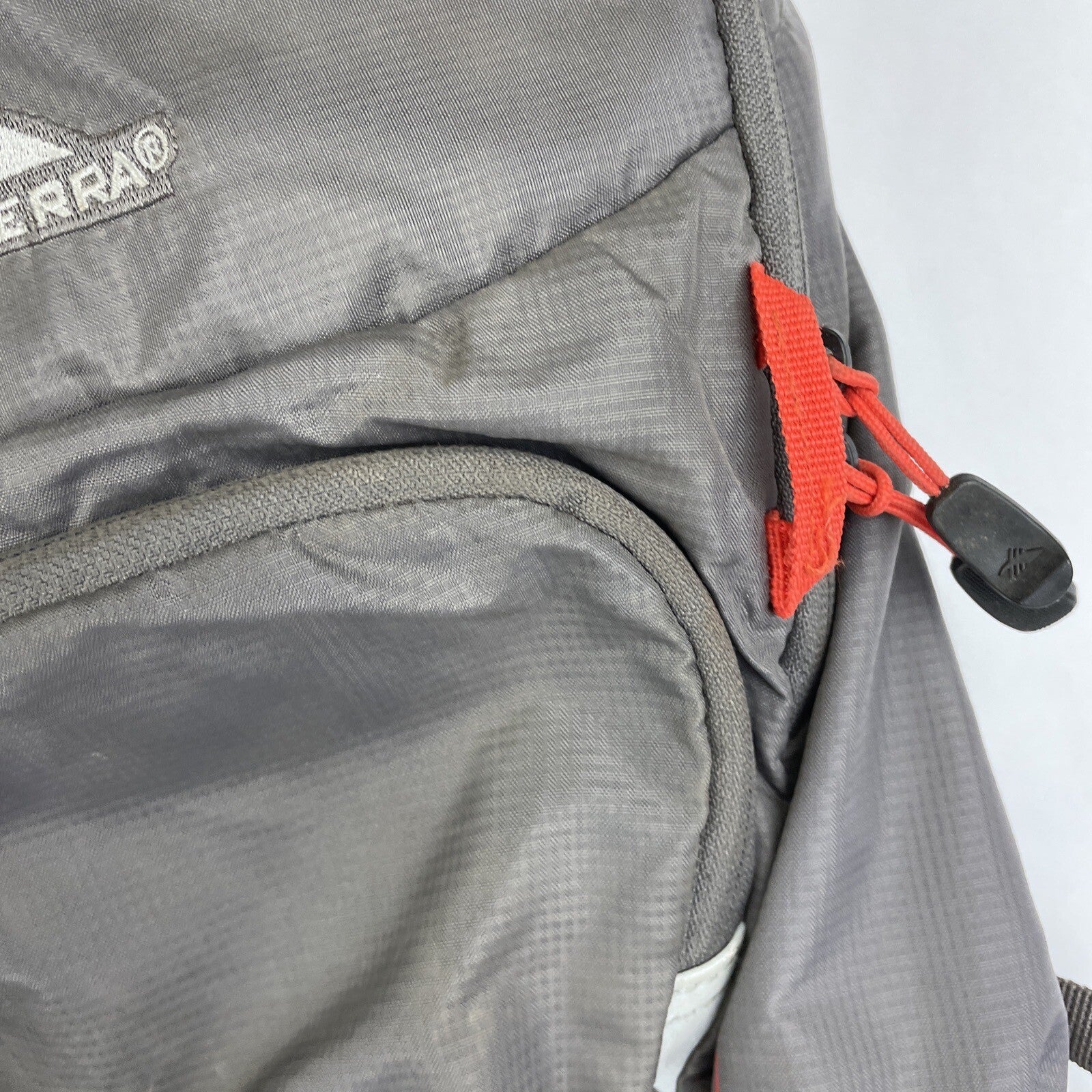 High Sierra Visalia gray hydration backpack with adjustable straps and mesh back panel.