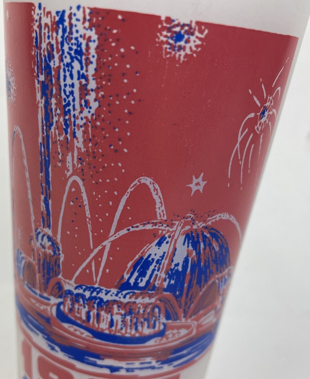 Vintage 1964–1965 New York World's Fair Pool of Industry souvenir glass with red white and blue graphics.
