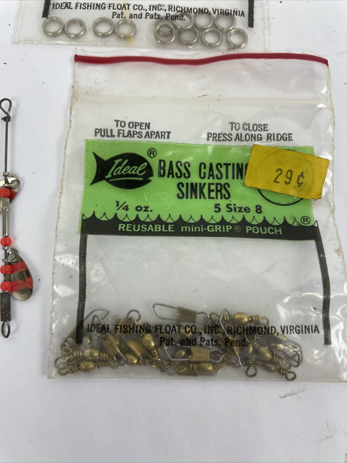Vintage fishing lure lot with Jitterbug Rebel Floater Mepps and Shyster lures for trout crappie and bass fishing