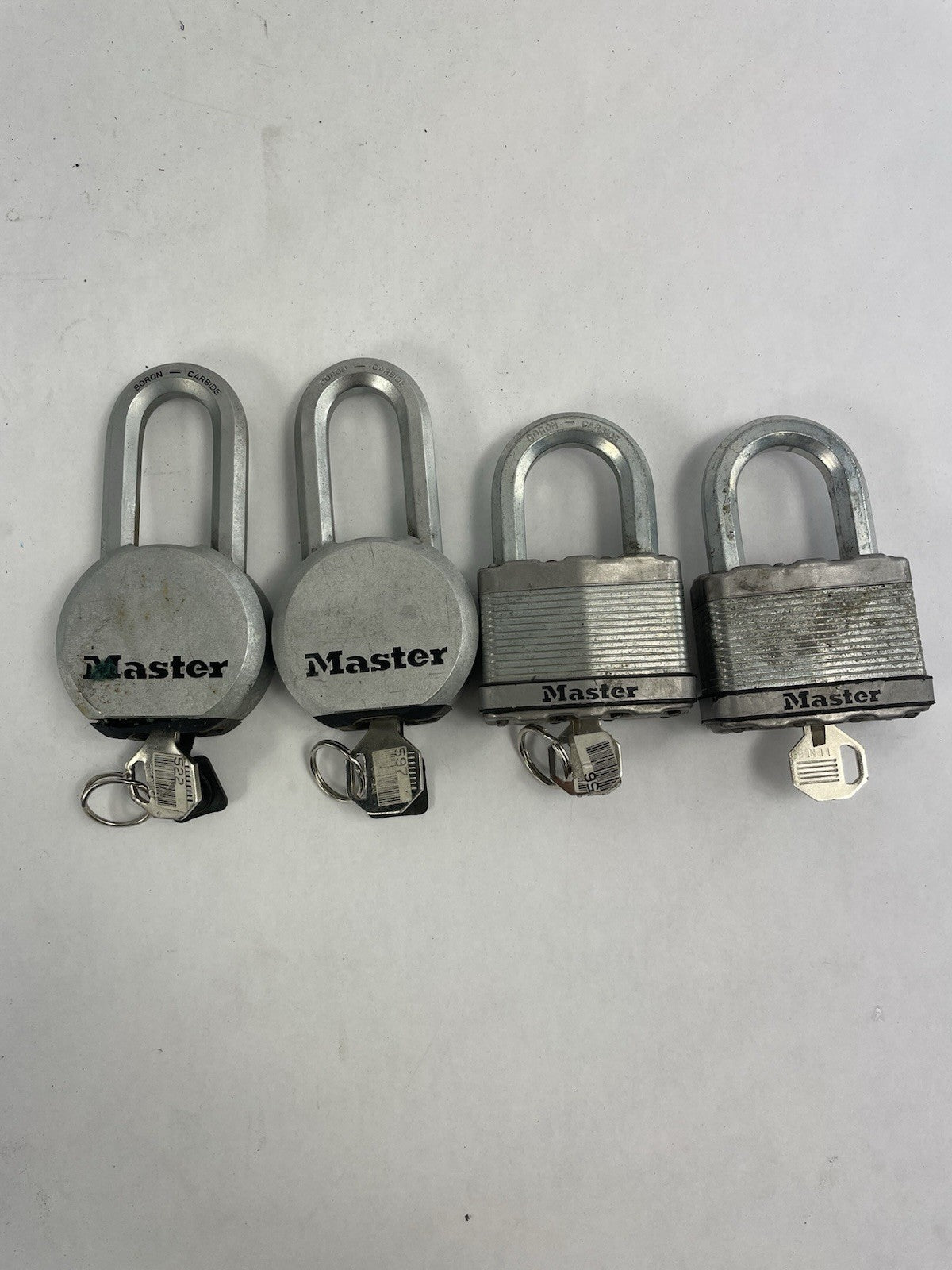Lot of 4: Master Solid Steel Boron Carbide Contractor Grade Padlock with Keys