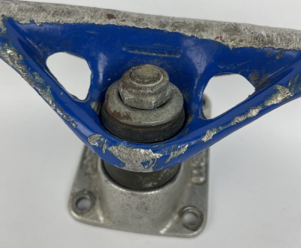 Vintage 1990s Webb Company USA blue single 8-inch skateboard truck.