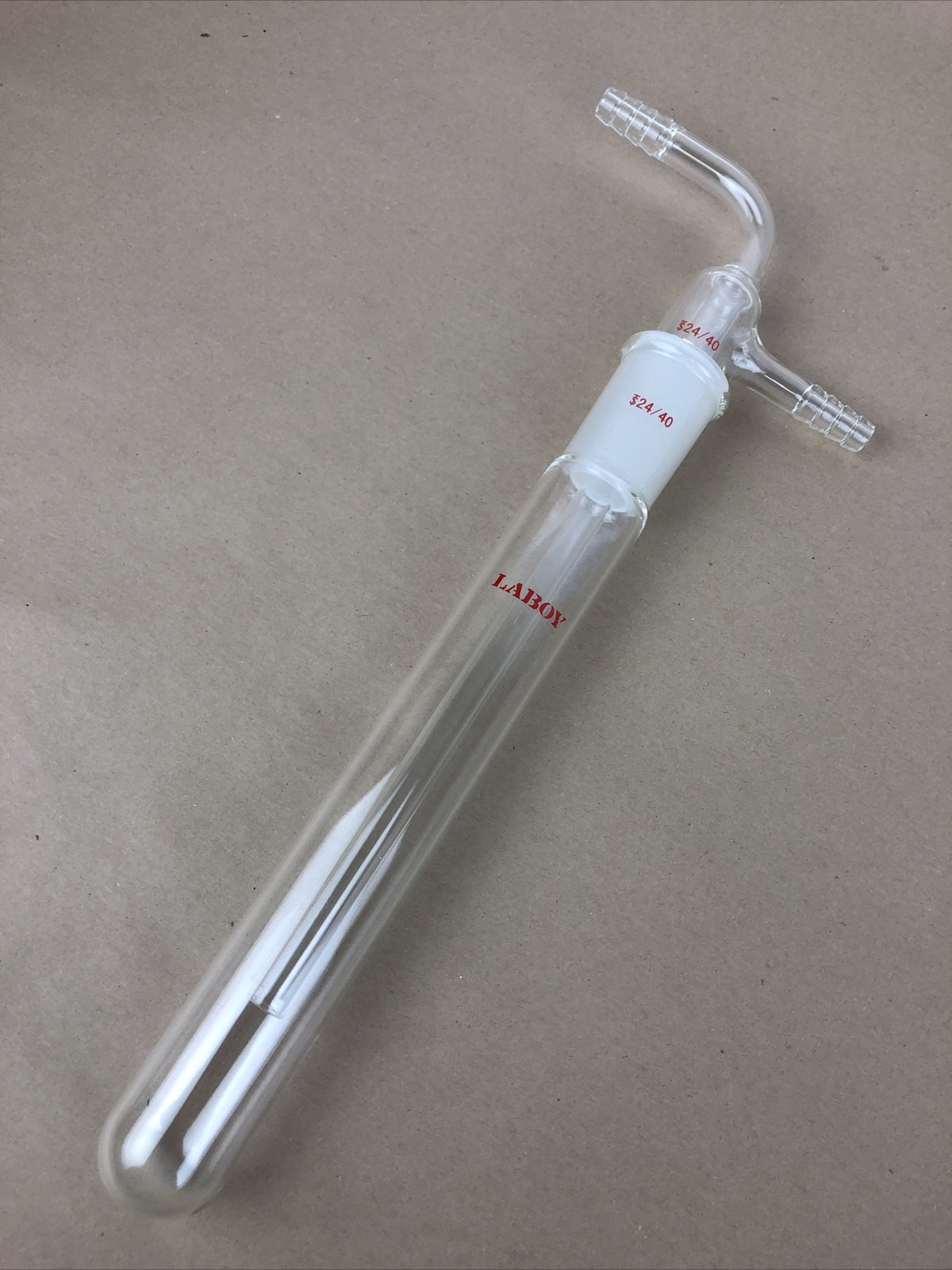 New Laboy borosilicate glass inlet adapter with 24/40 inner glass joint and beaker.