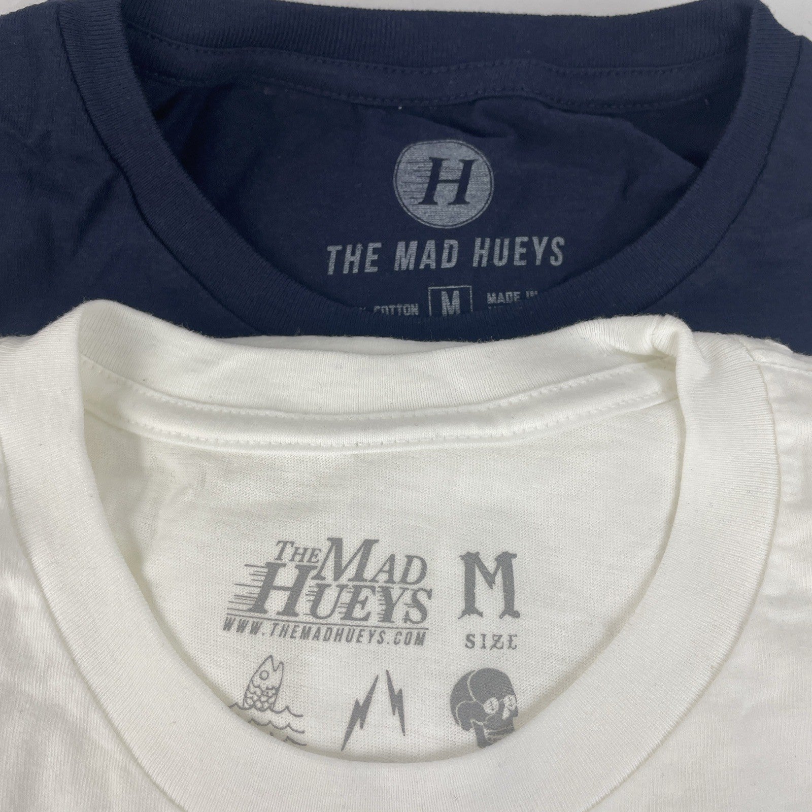 Lot of two new The Mad Hueys Tight Lines ocean fishing T-shirts in men's medium