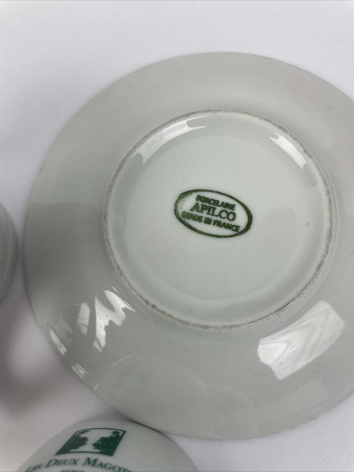 Apilco Les Deux Magots Paris France porcelain espresso cup saucer and cream pitcher set