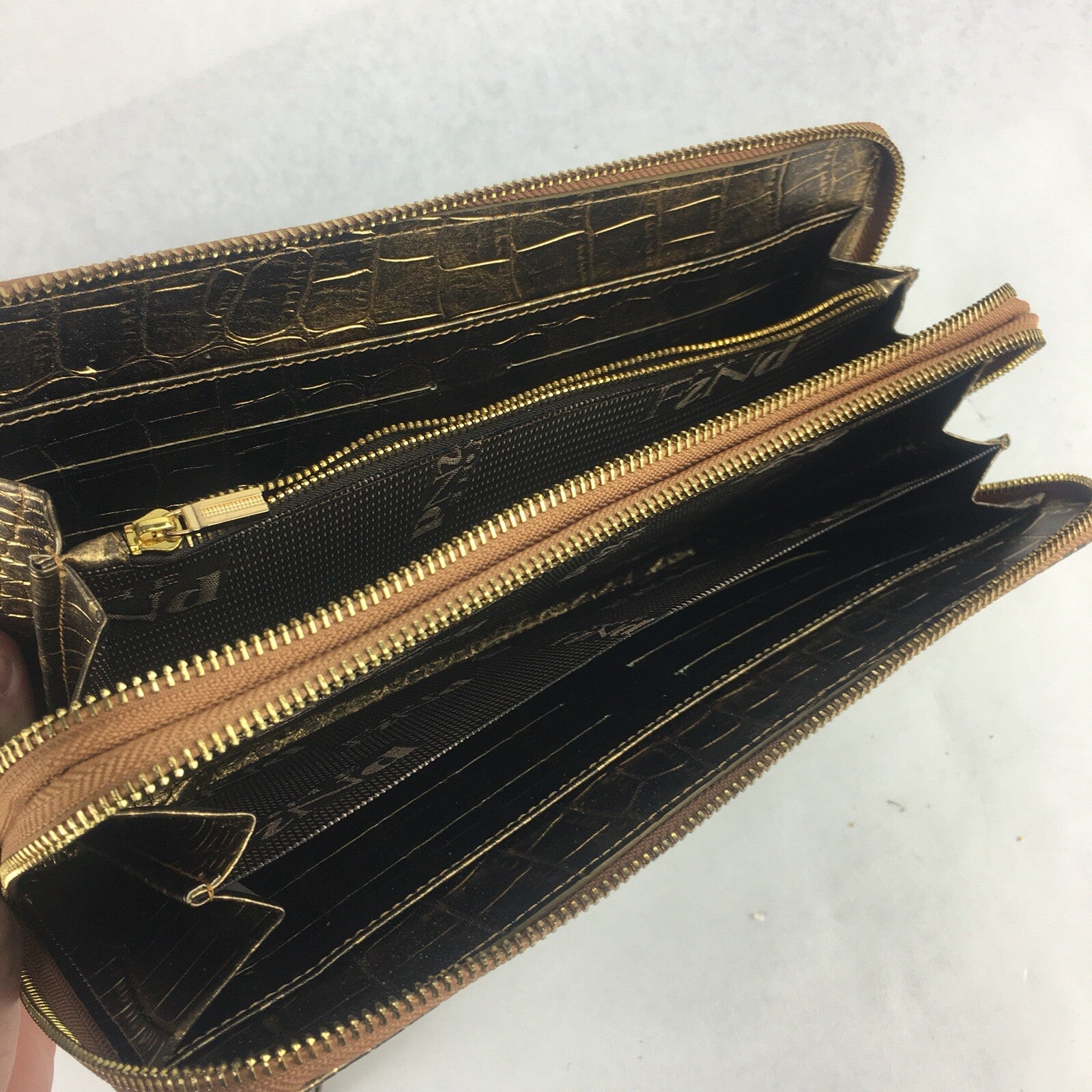 The Find - Faux Gold Leather Hand Purse