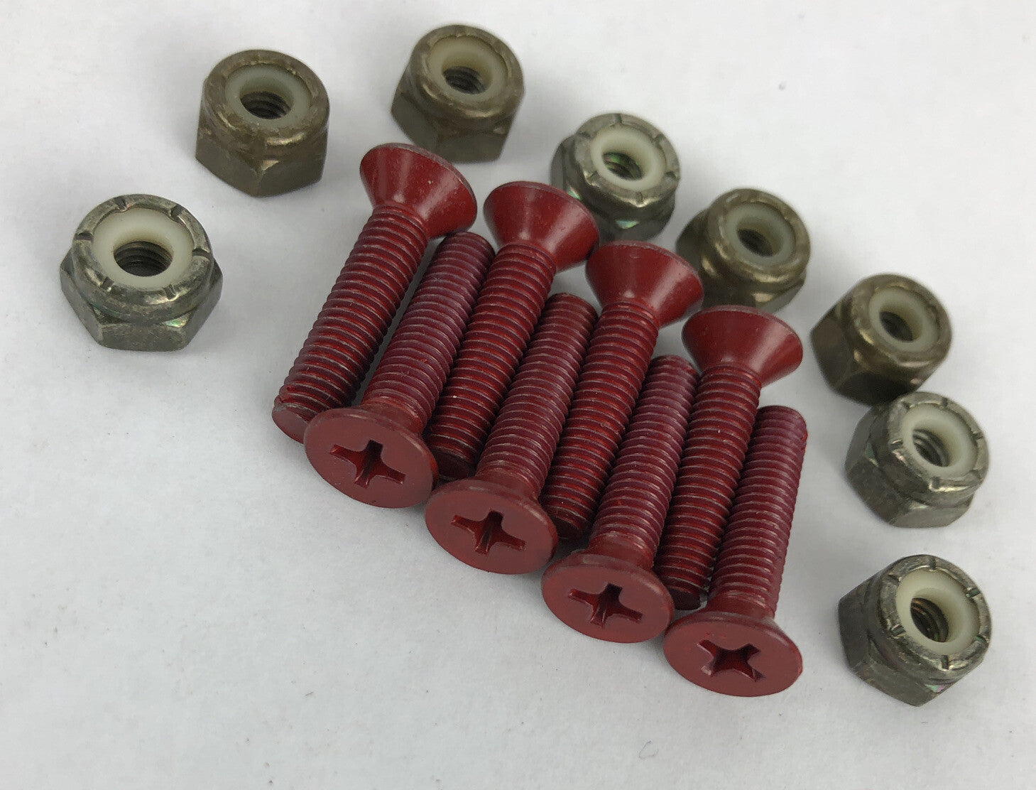 CARGO 7/8-inch red Phillips head skateboard hardware set with bolts, lock nuts, and free shipping.