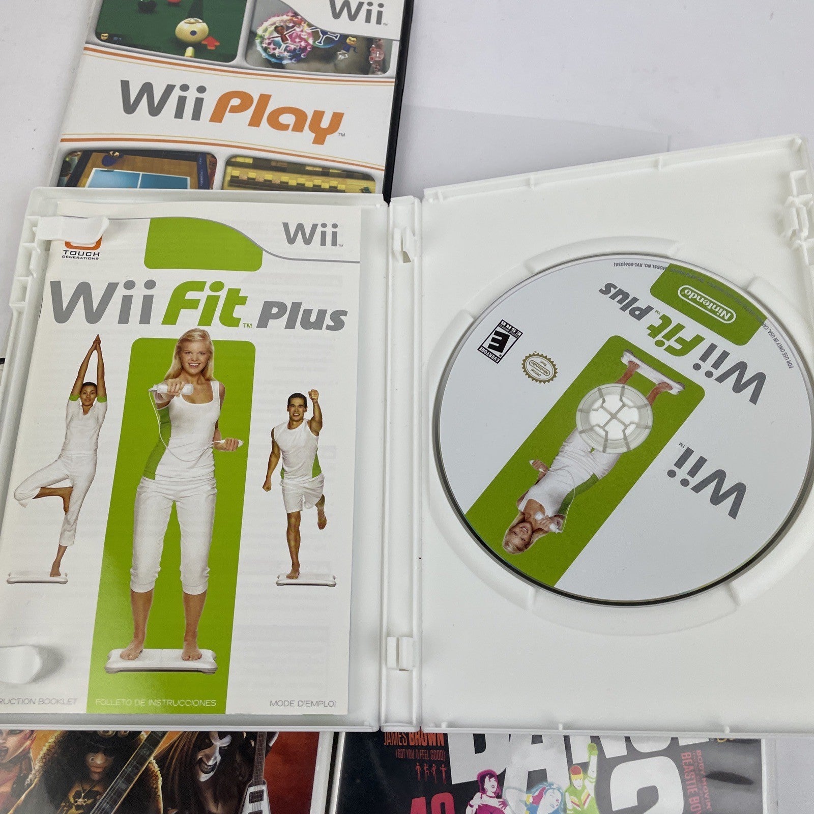 Lot Of 4 Wii Games - Wii Play, Fit Plus, Just Dance 2, Guitar Hero III Legends