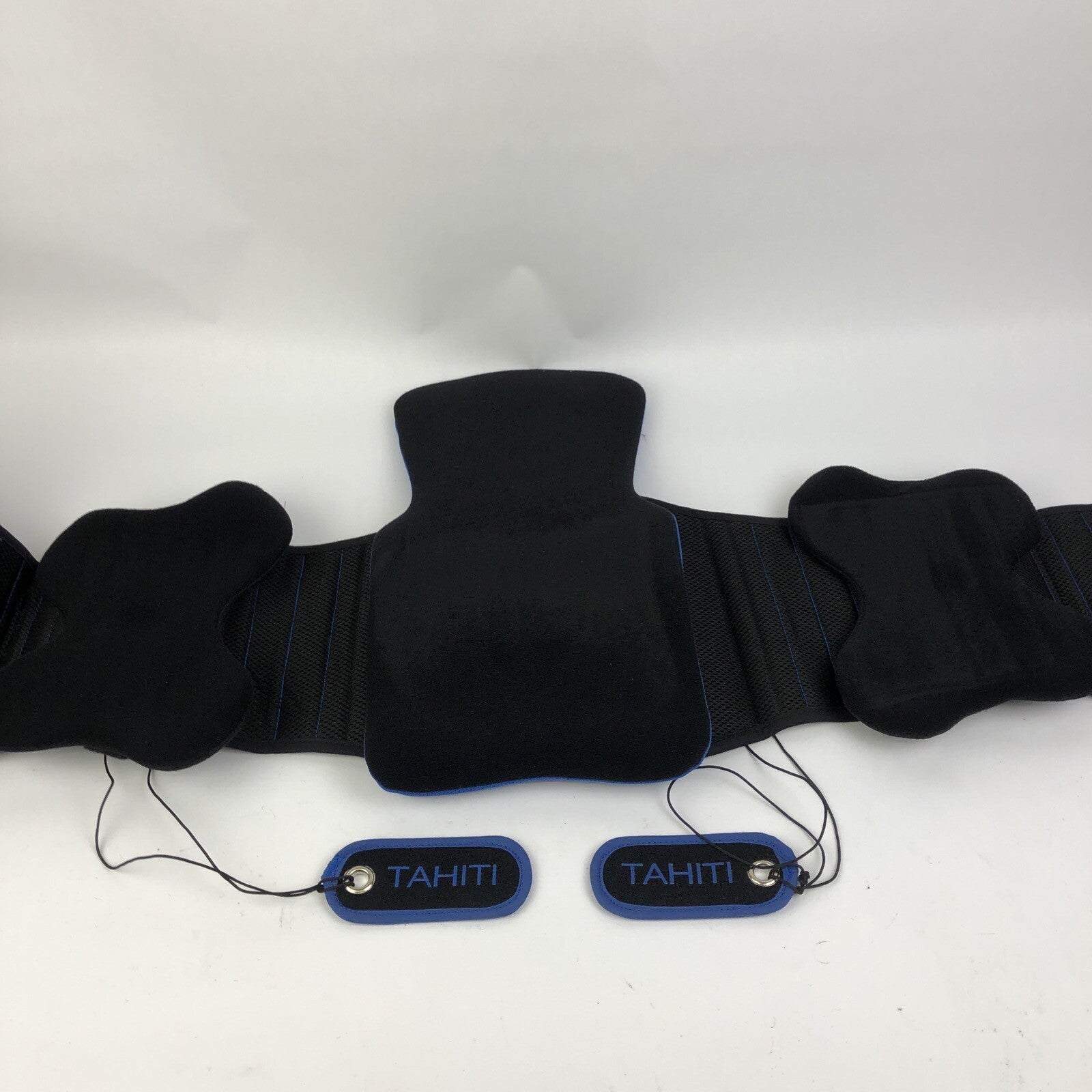 Black unisex lumbar support back brace with pulley adjustment system.