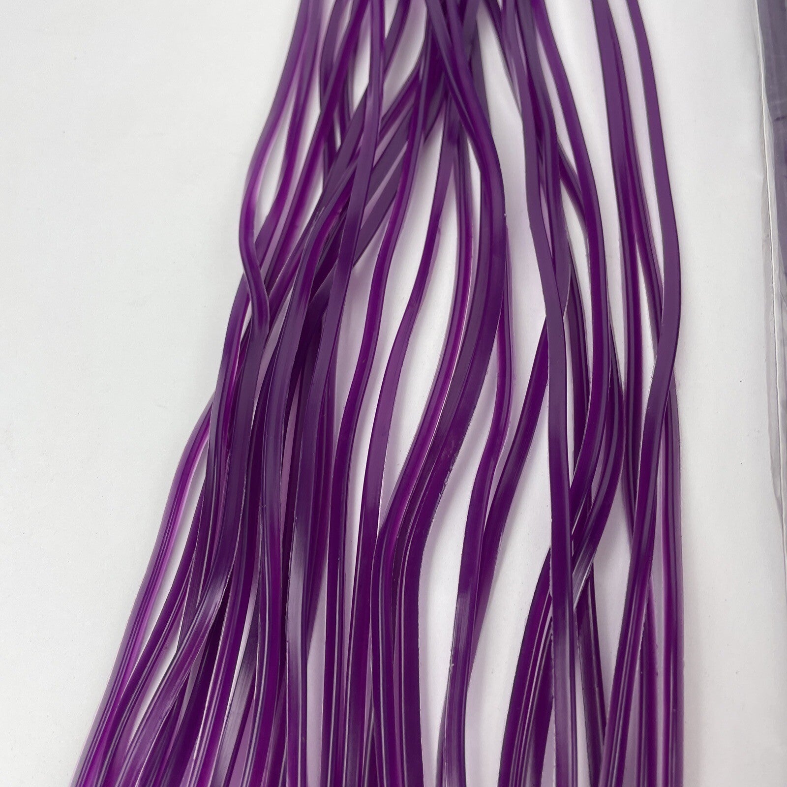 Newell MFG purple offshore trolling fishing skirts 10 pack for tuna and marlin lures.