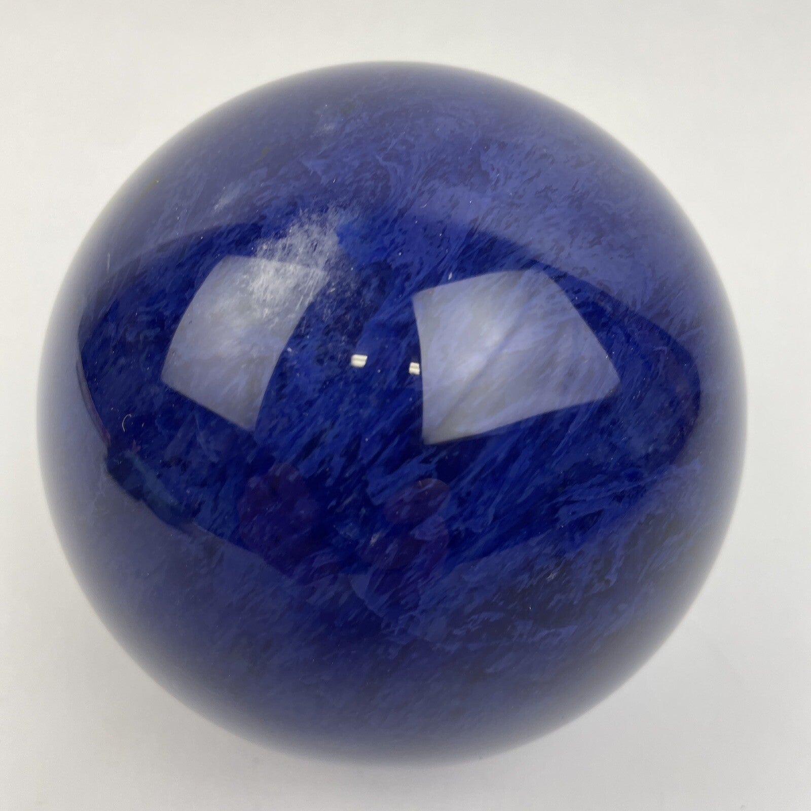 Hand blown cobalt blue crystal art glass paperweight measuring 4 inches and weighing 3.7 lbs.