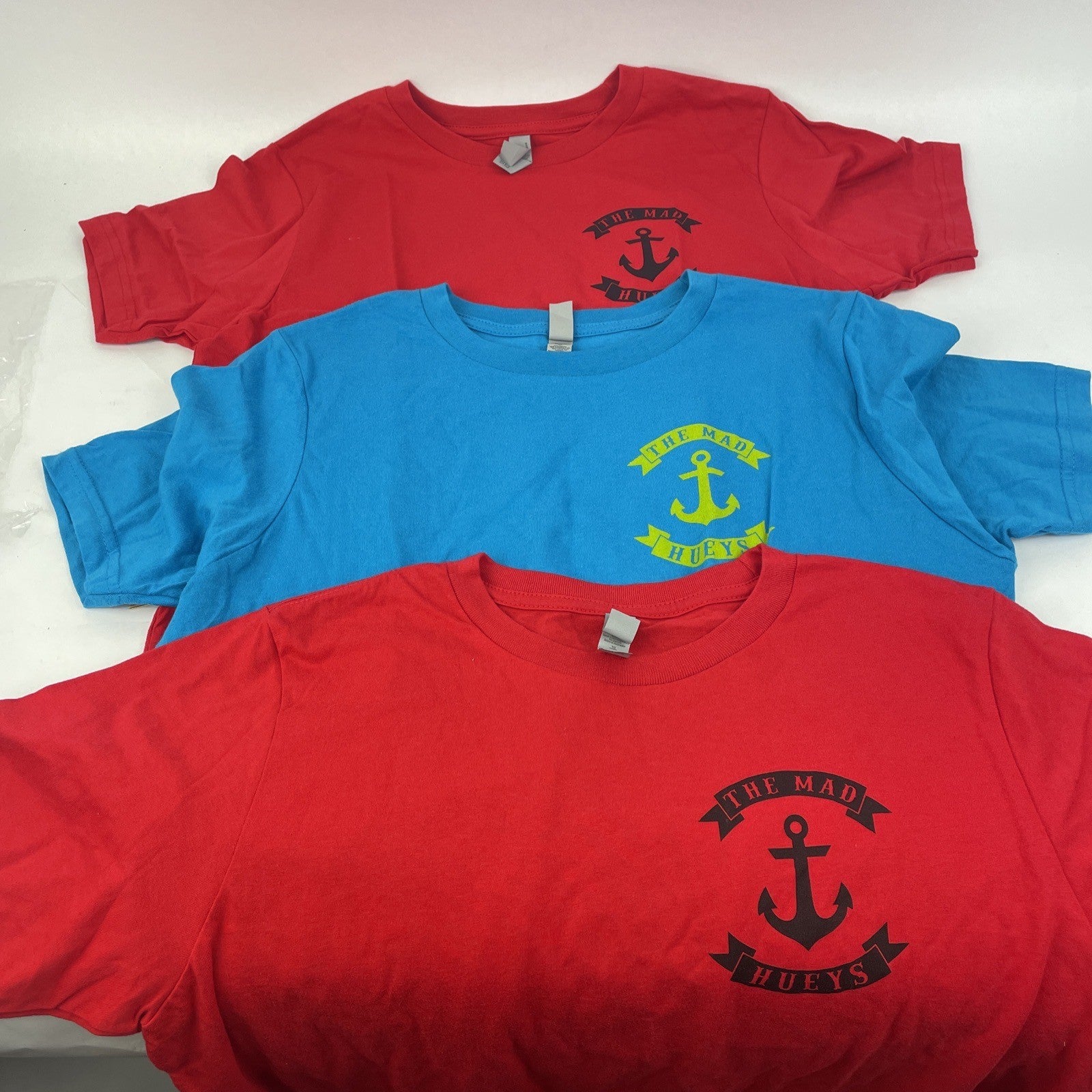 Lot of 3 x NEW Original THE MAD HUEYS Ocean Fishing T-Shirts 2 x Red 1 x Teal