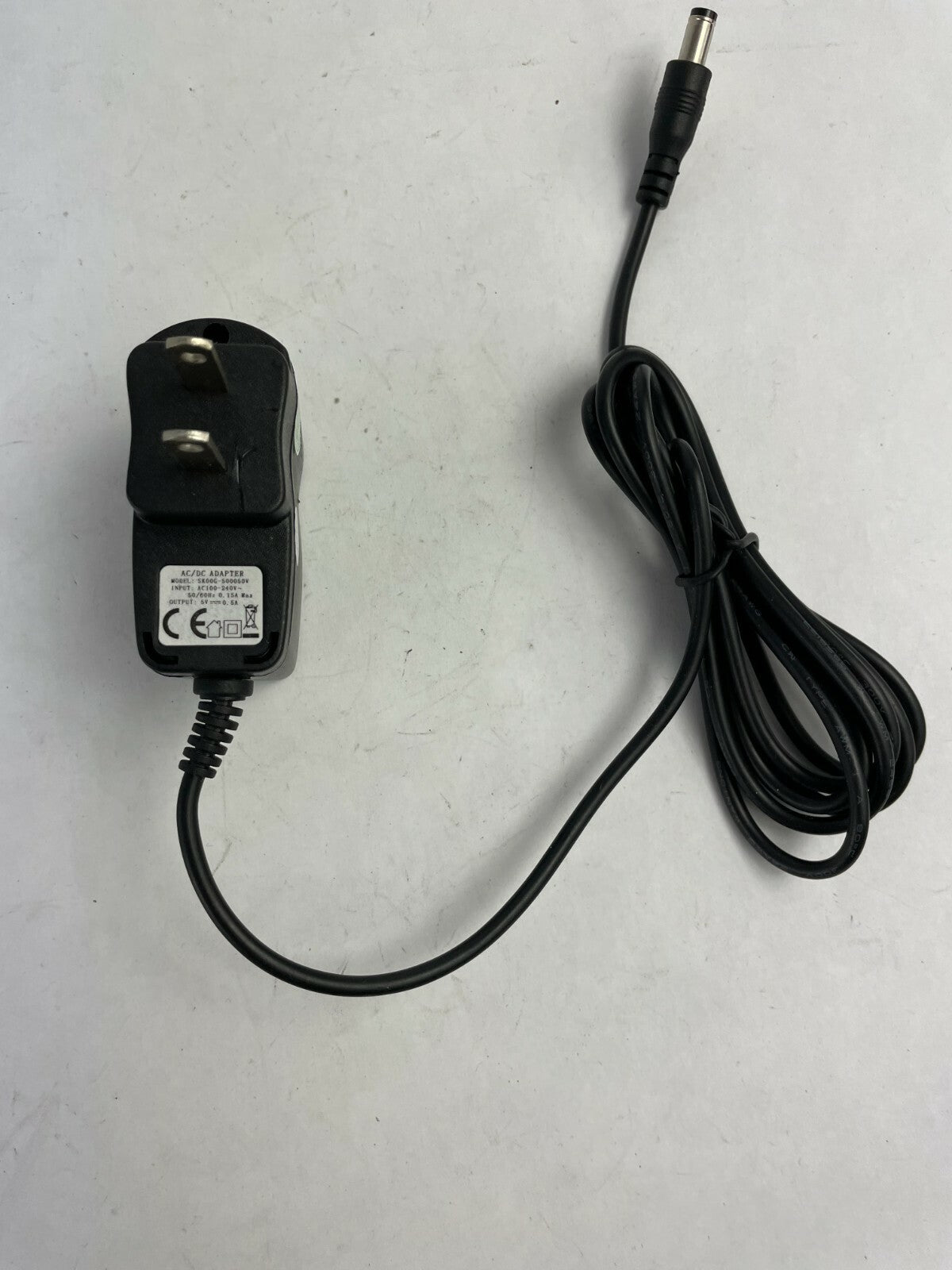 Genuine Ac Adapter SK00G-500050V Output 5 V 0.5 A Power Supply Adapter A75