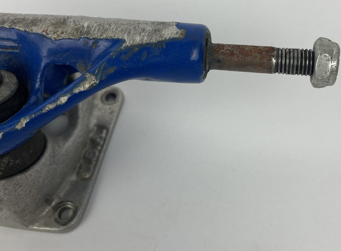 Vintage 1990s Webb Company USA blue single 8-inch skateboard truck.