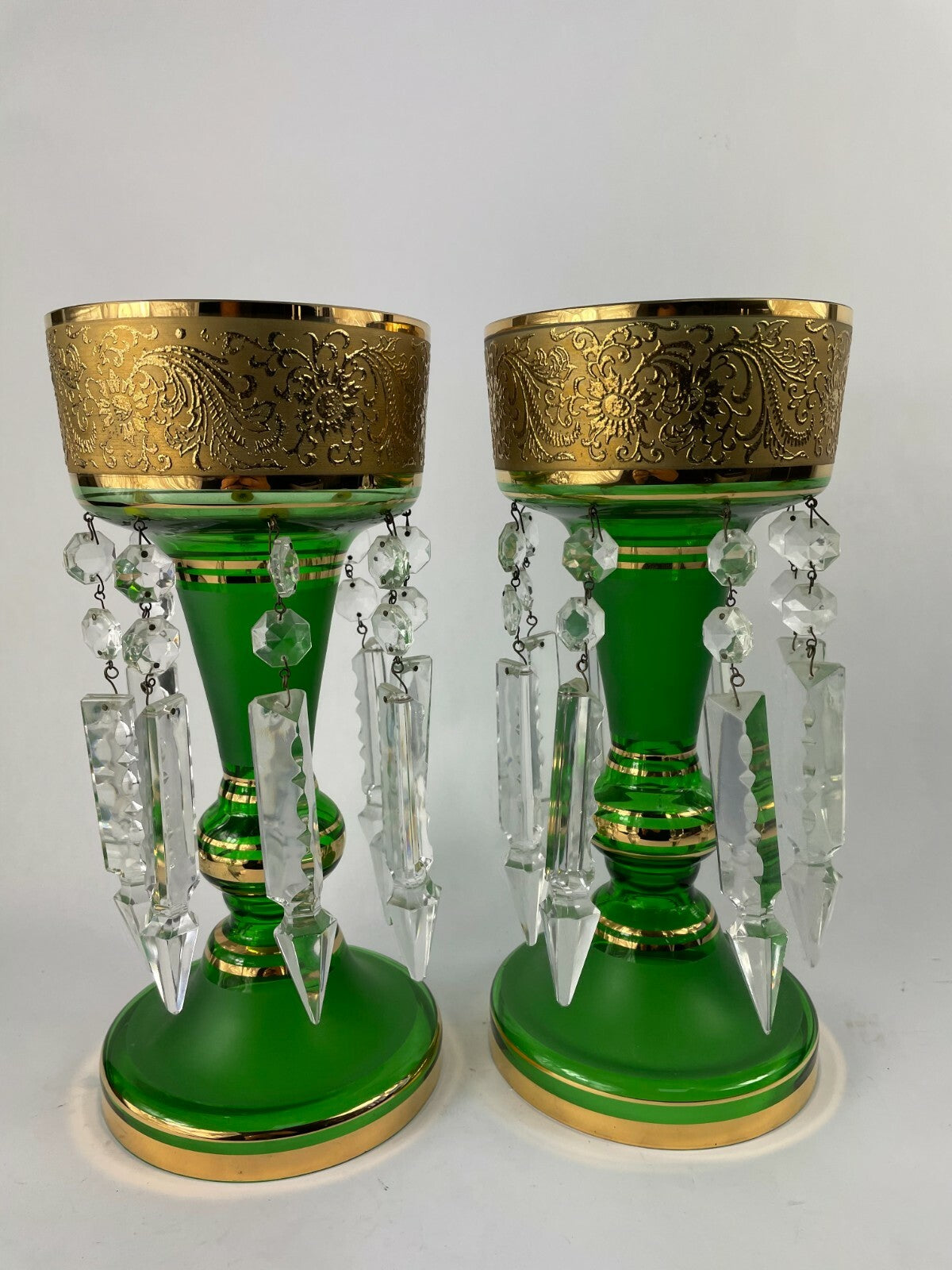 Set of two beautifully designed decorative crafted clear glass display articles.