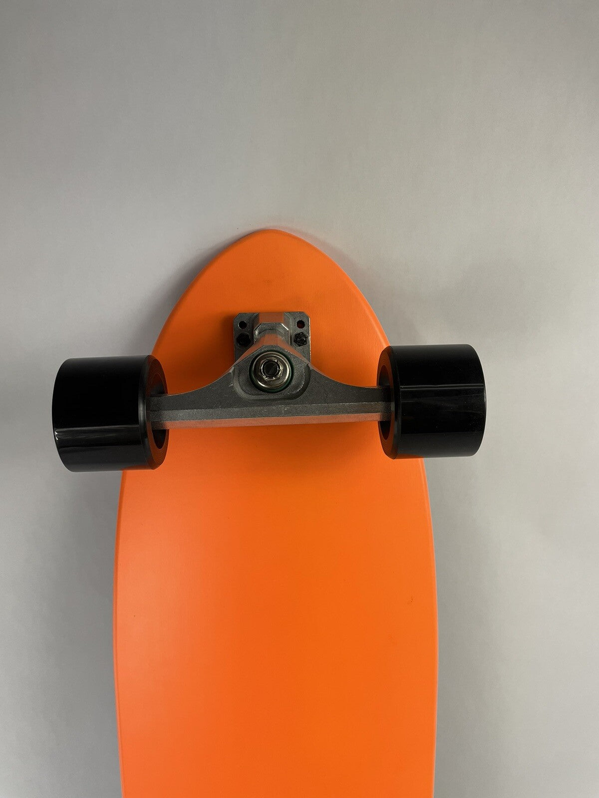 Orange Surf Fish Blank 10-inch complete skateboard with reverse kingpin trucks, 70mm wheels, and ABEC-7 bearings.