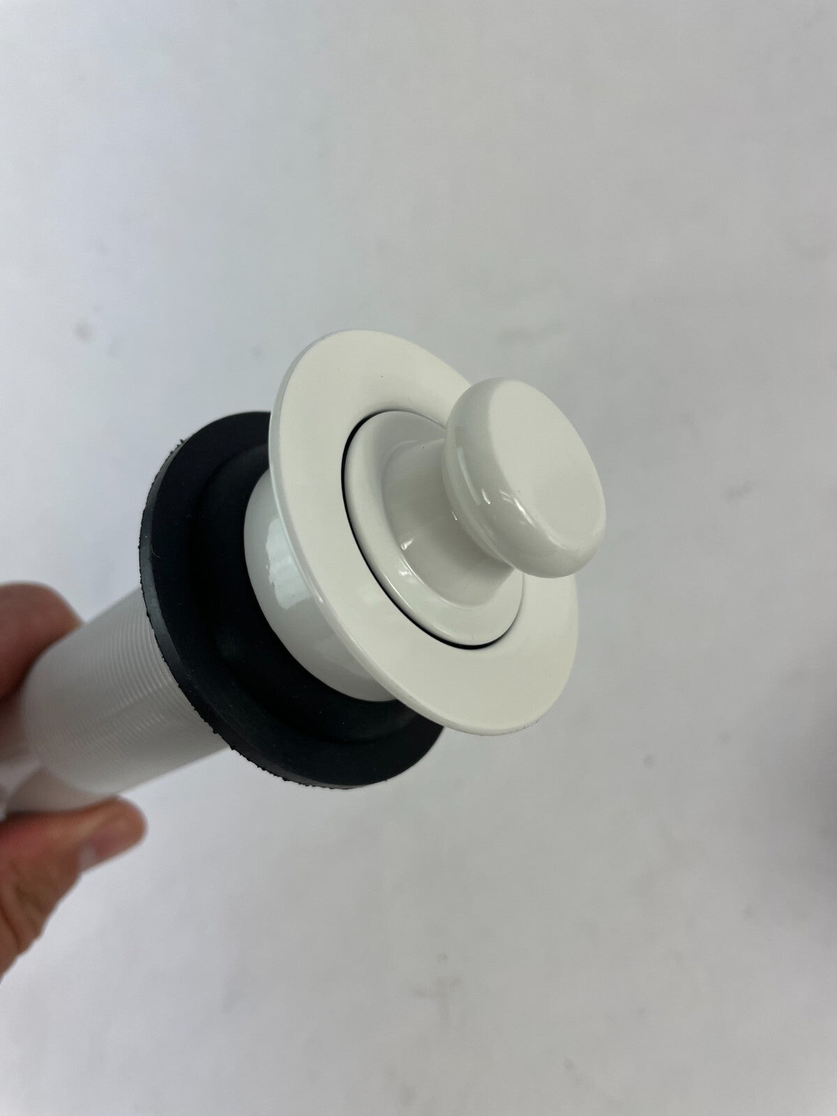 Rubinet 9DPU3WH white exposed lift and turn bathroom sink drain with overflow