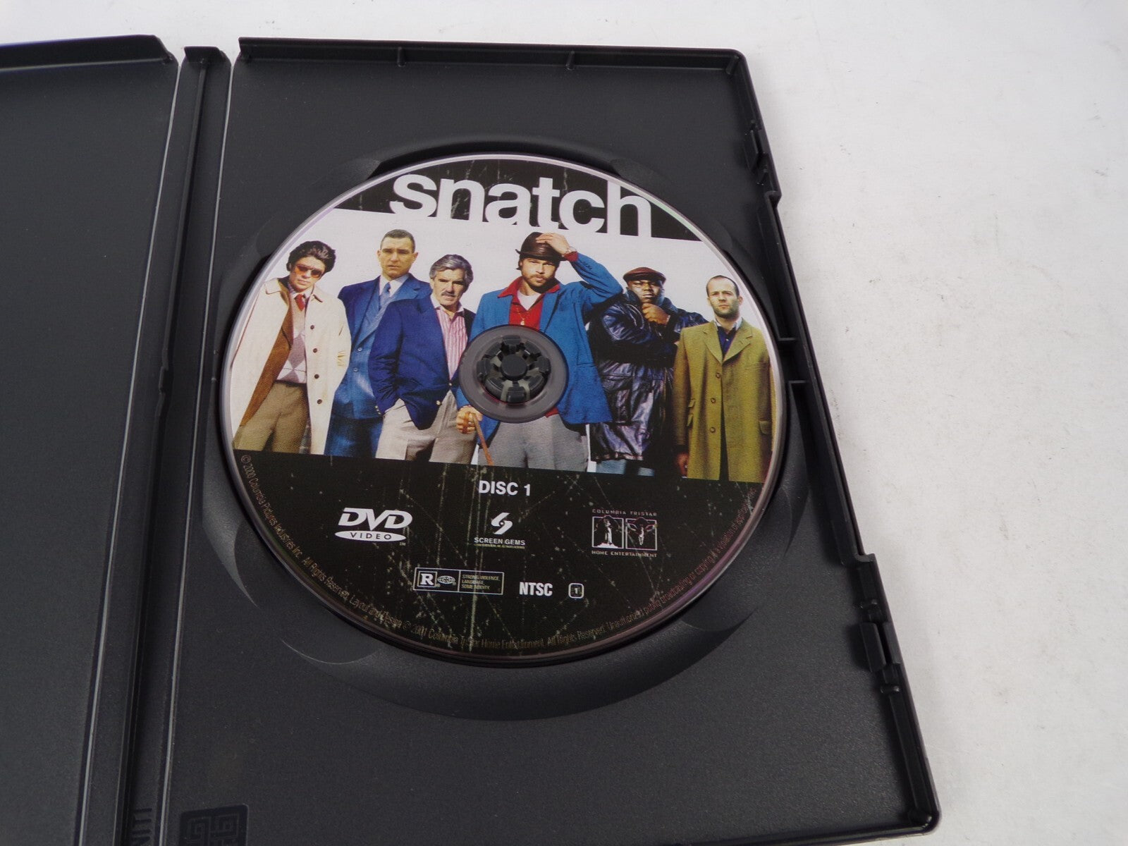 Snatch "A Rock-'em Sock- 'em Caper With Energy To Spare." Benicid Del DVD Movies