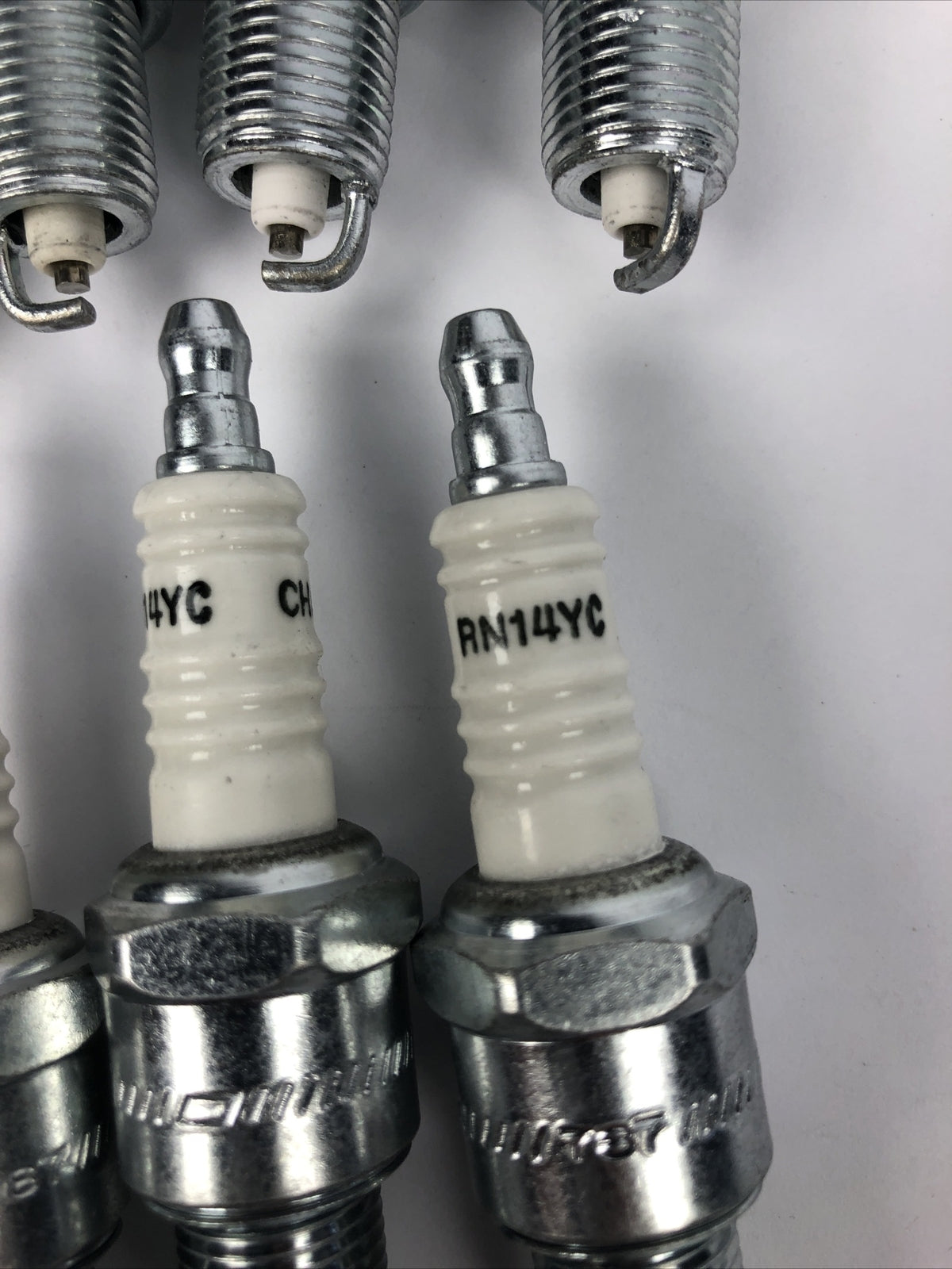 Lot of 7 Champion RN14YC spark plugs NAPA 405 replacement ignition set automotive engine tune up plugs